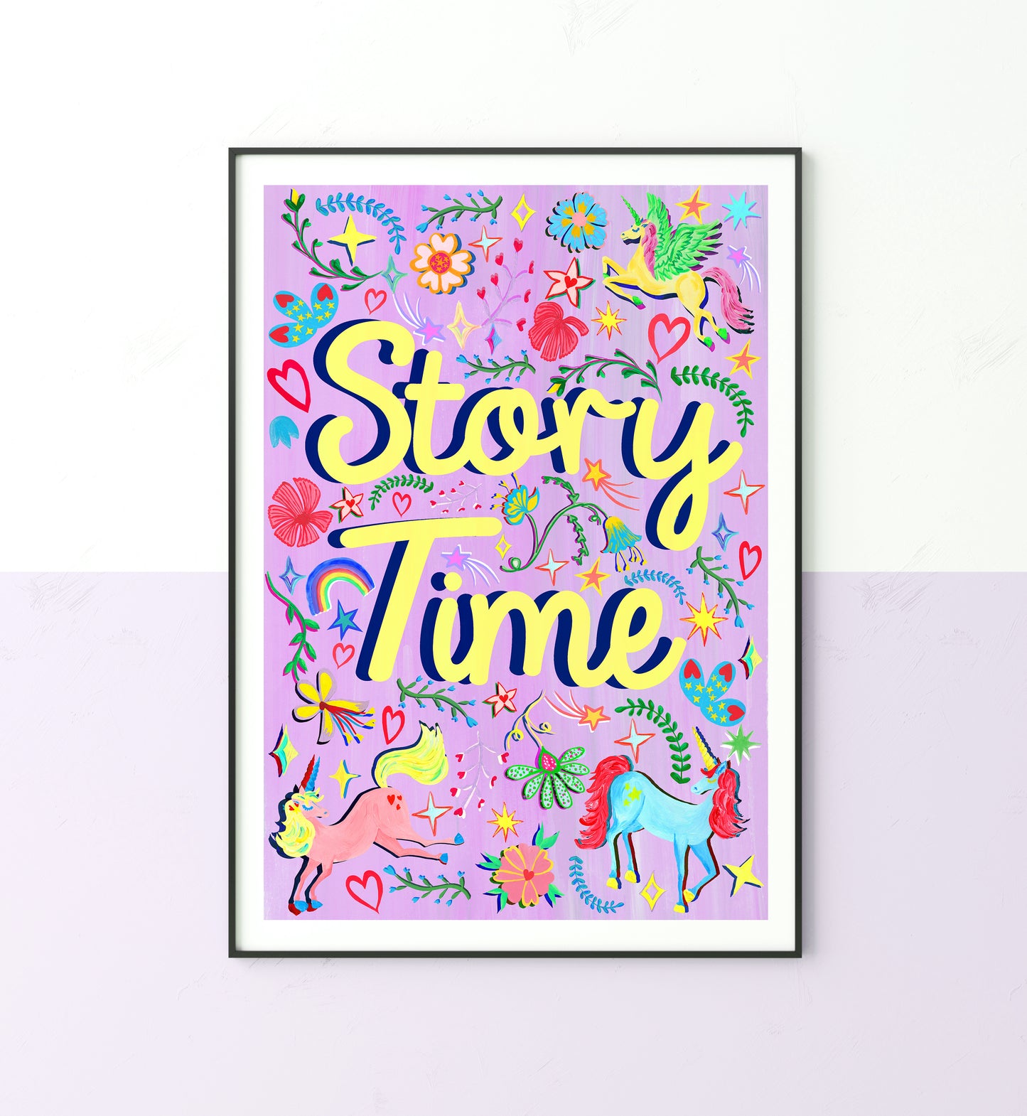 Framed artwork with 'Story Time' text and colorful illustrations on a purple background