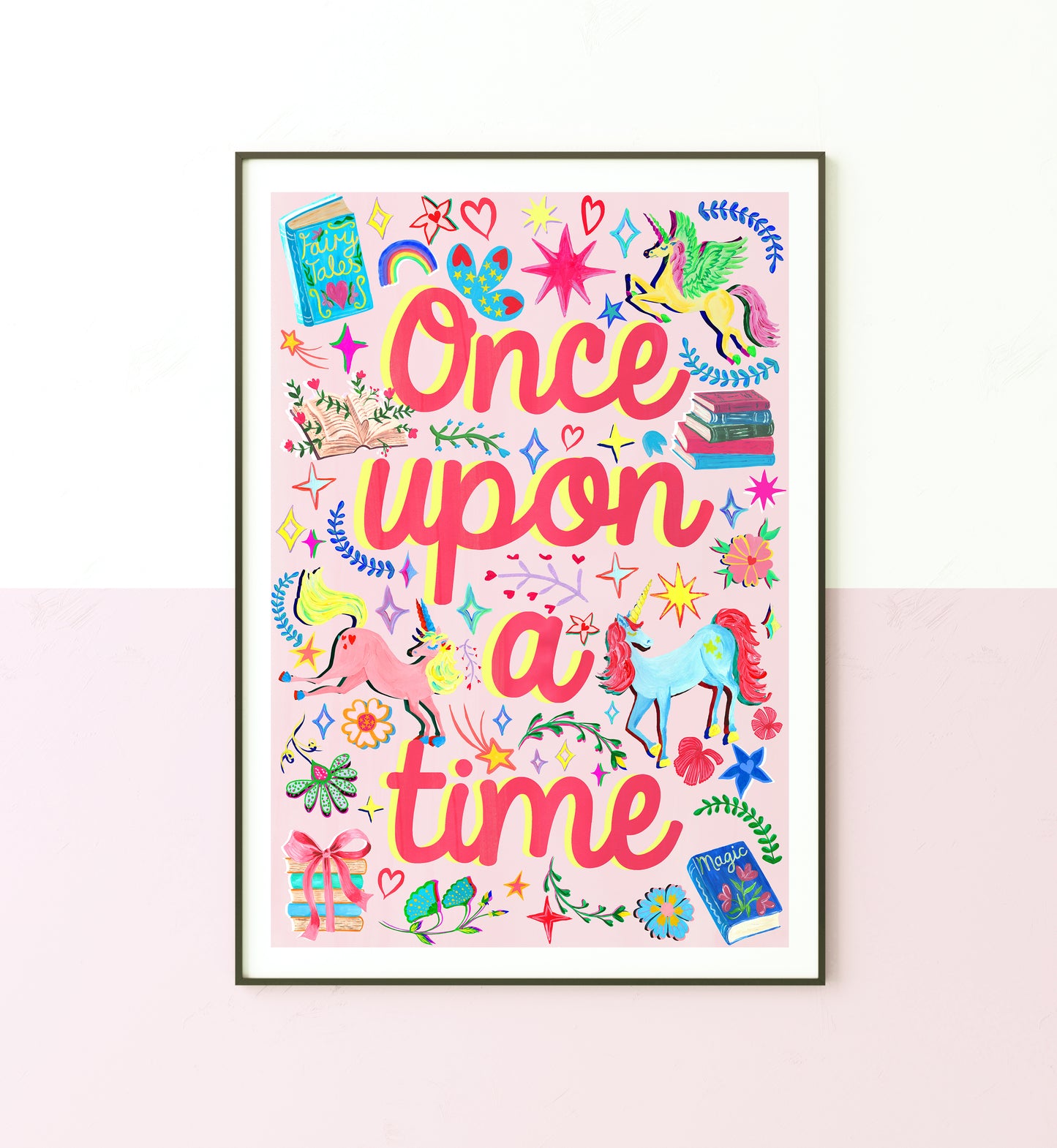 Framed colorful print with 'Once upon a time' text and illustrations on a white background