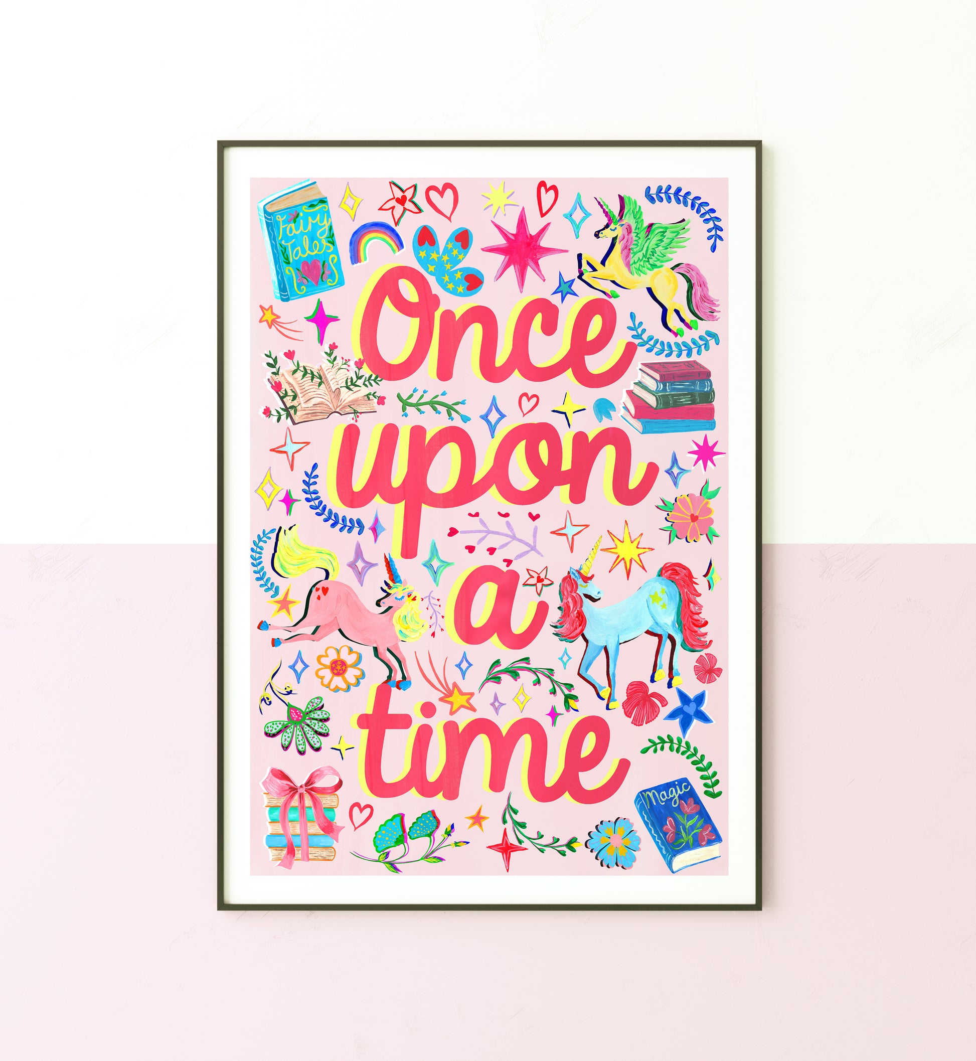 Framed colorful print with 'Once upon a time' text and illustrations on a white background