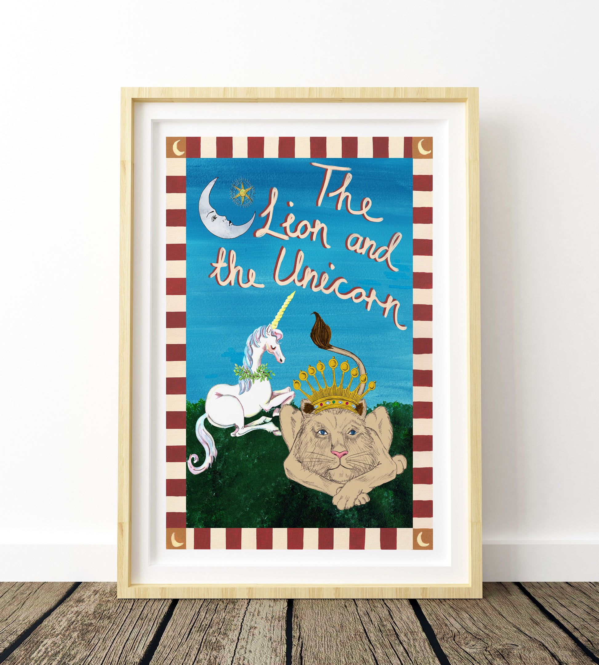 Framed artwork titled 'The Lion and the Unicorn' with a lion and unicorn illustration on a striped background.
