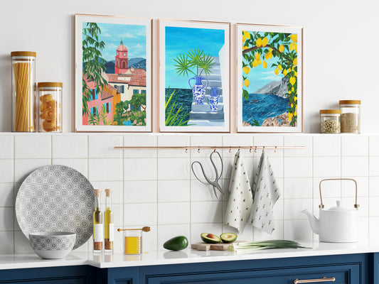 Kitchen with colorful framed prints on the wall