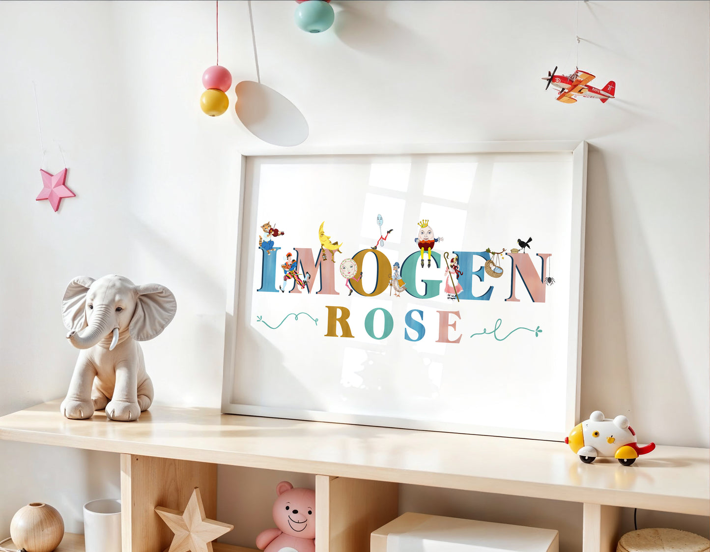Children's room with a colorful name sign, toys, and decorative items.