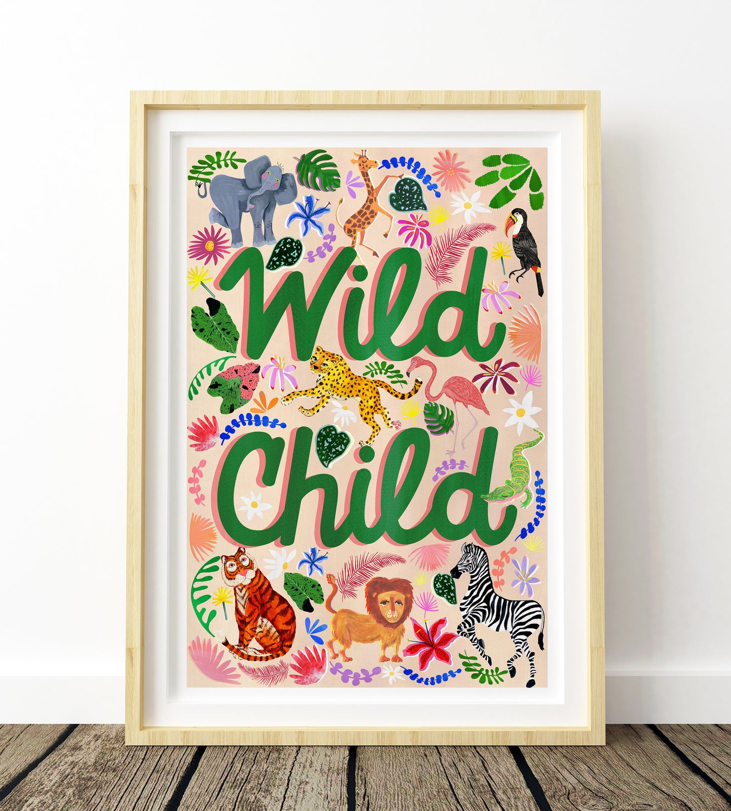 A colourful safari animal nursery print with the words 'Wild Child' in the centre