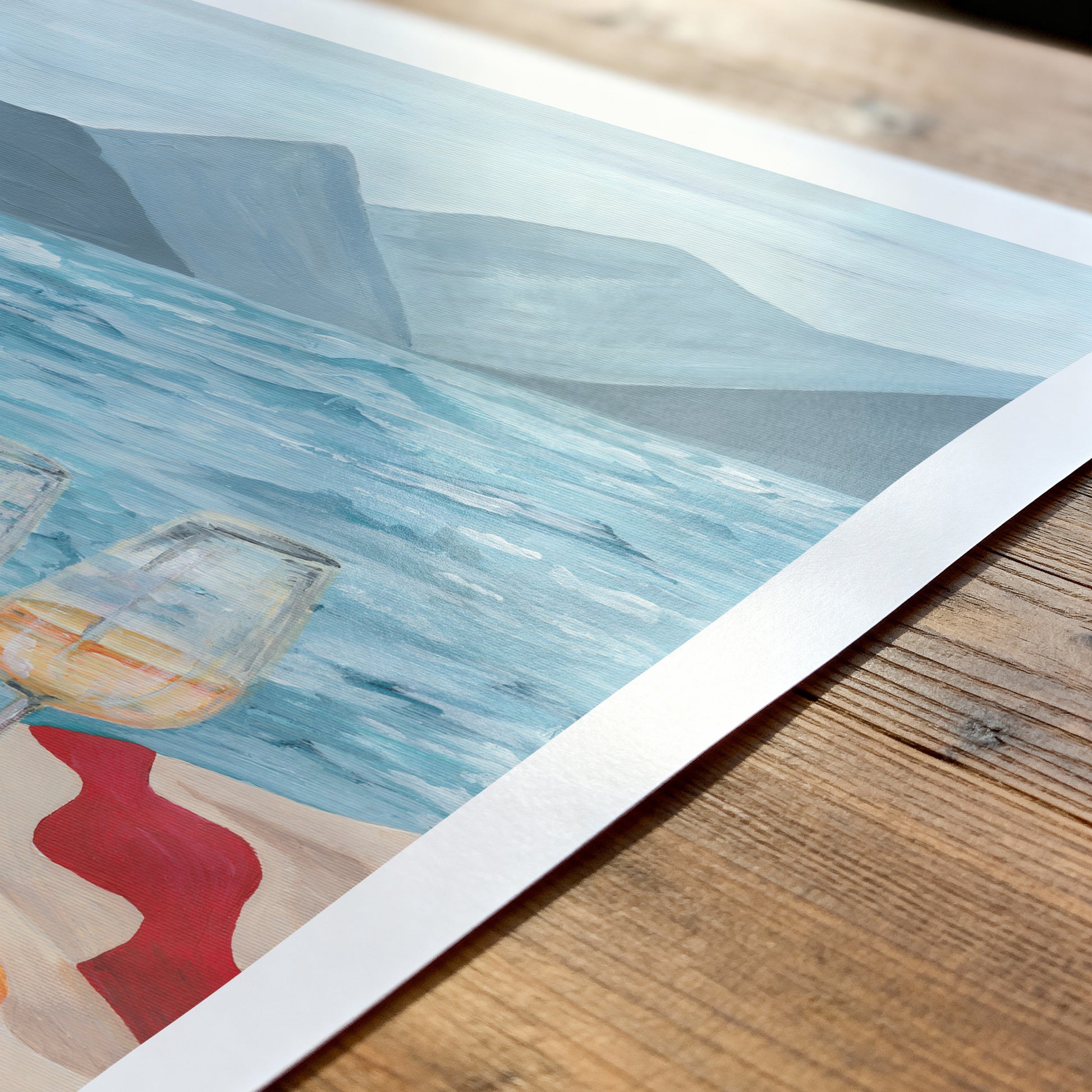 Artistic depiction of a person with a glass of wine on a wooden surface