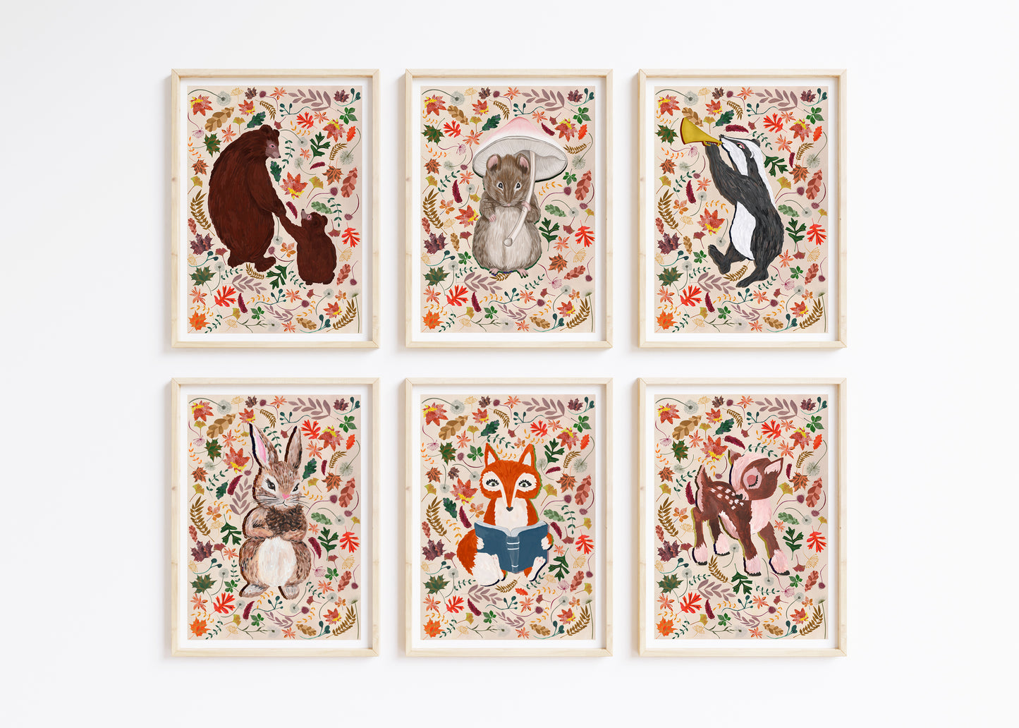 Set of six framed animal illustrations with floral patterns on a white background