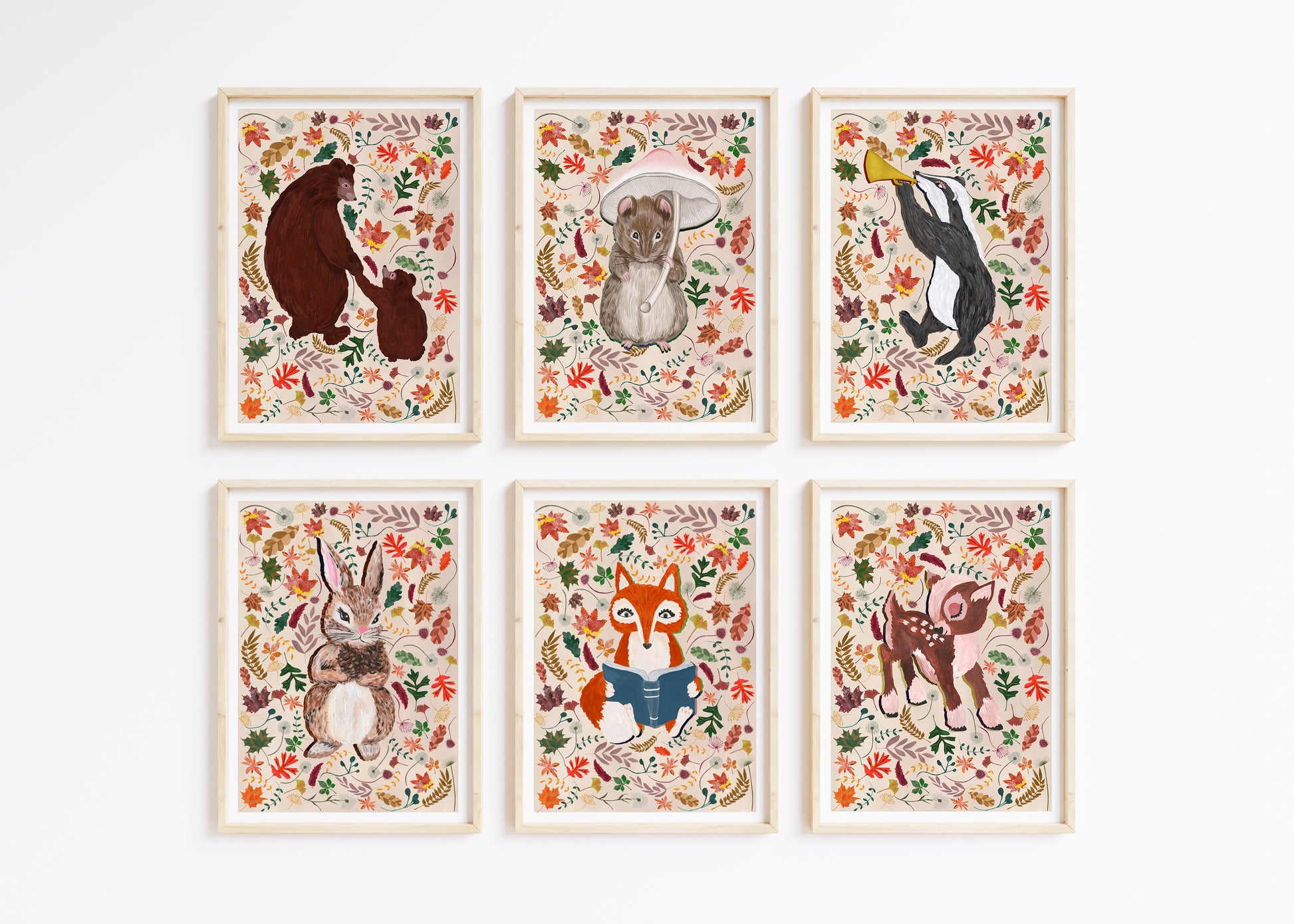 Set of six framed animal illustrations with floral patterns on a white background
