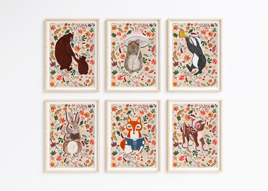 Set of six framed animal illustrations with floral patterns on a white background