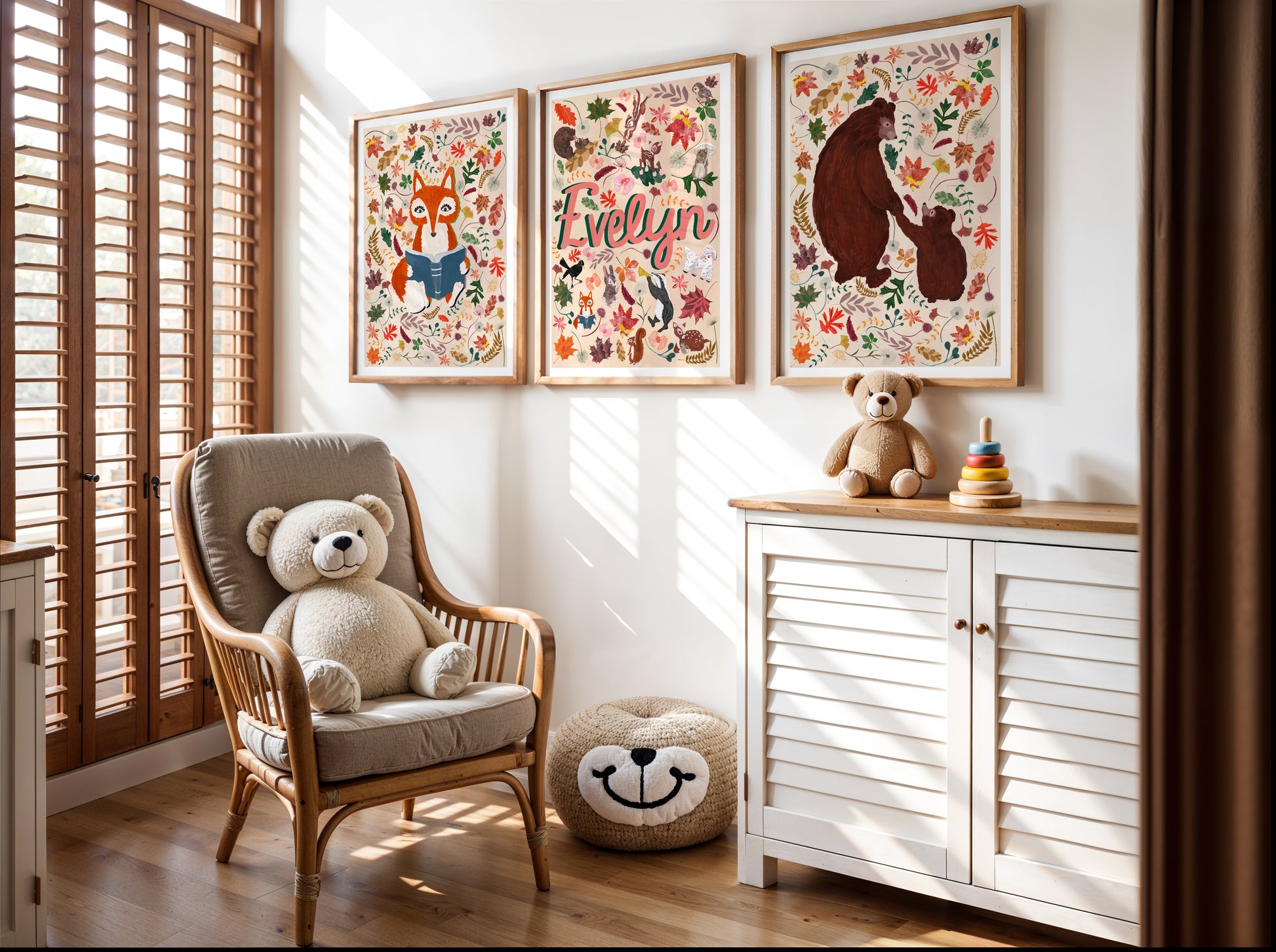 Children's room with a teddy bear chair, cabinet, and woodland animal wall art including a woodland animal name print.