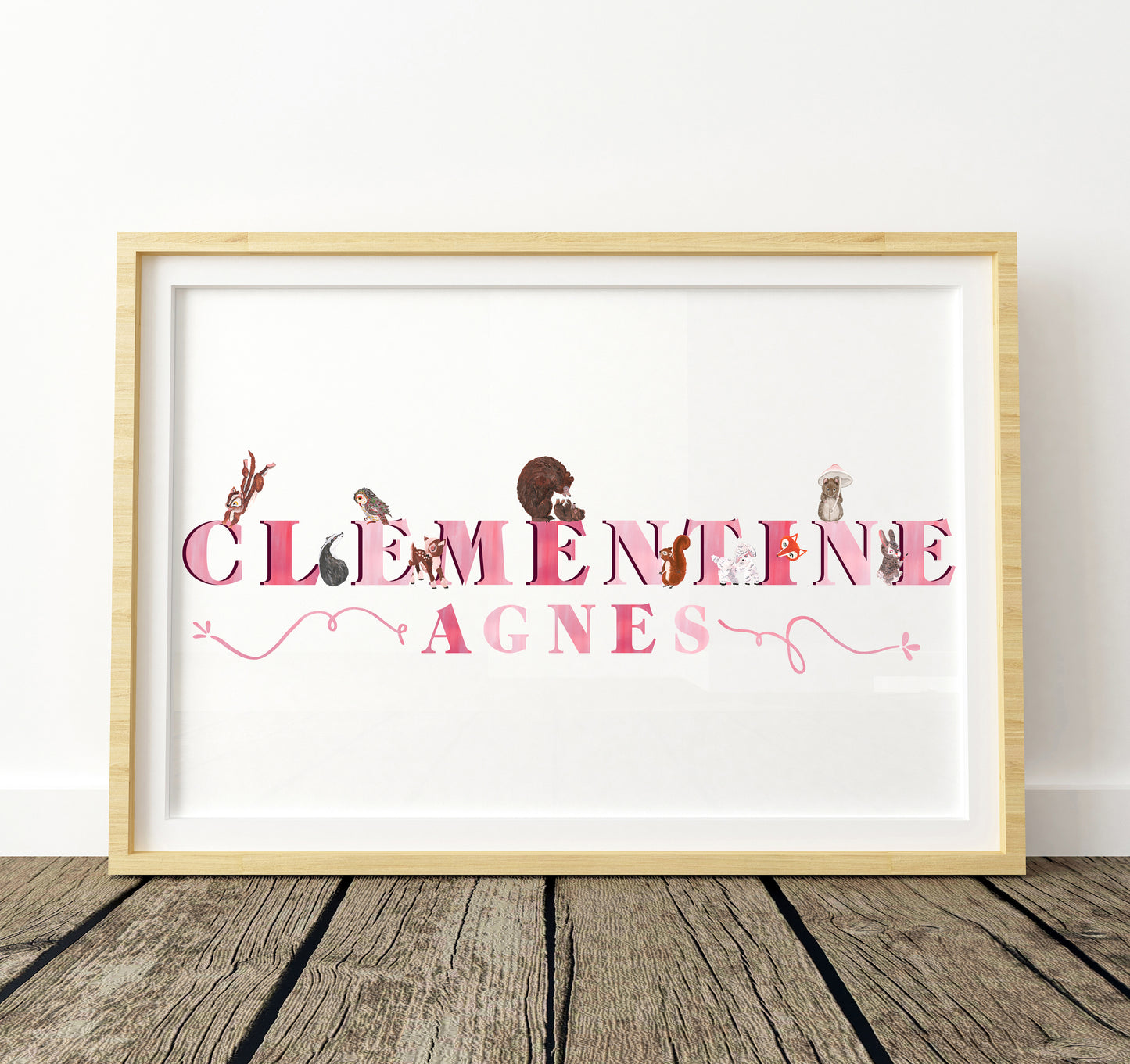 Framed artwork with 'Clementine Agnes' and woodland animal illustrations on a white background.