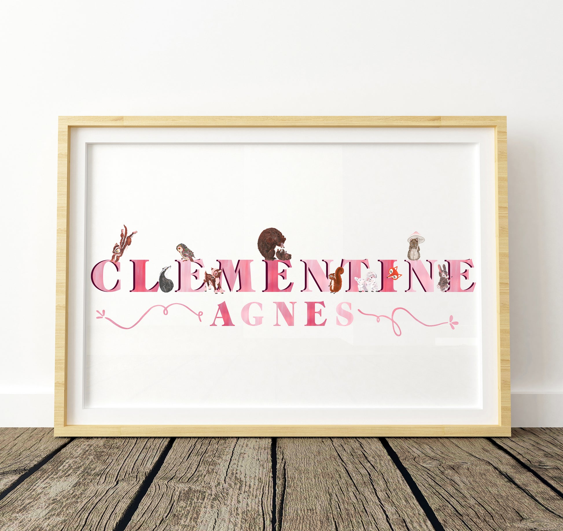 Framed artwork with 'Clementine Agnes' and woodland animal illustrations on a white background.