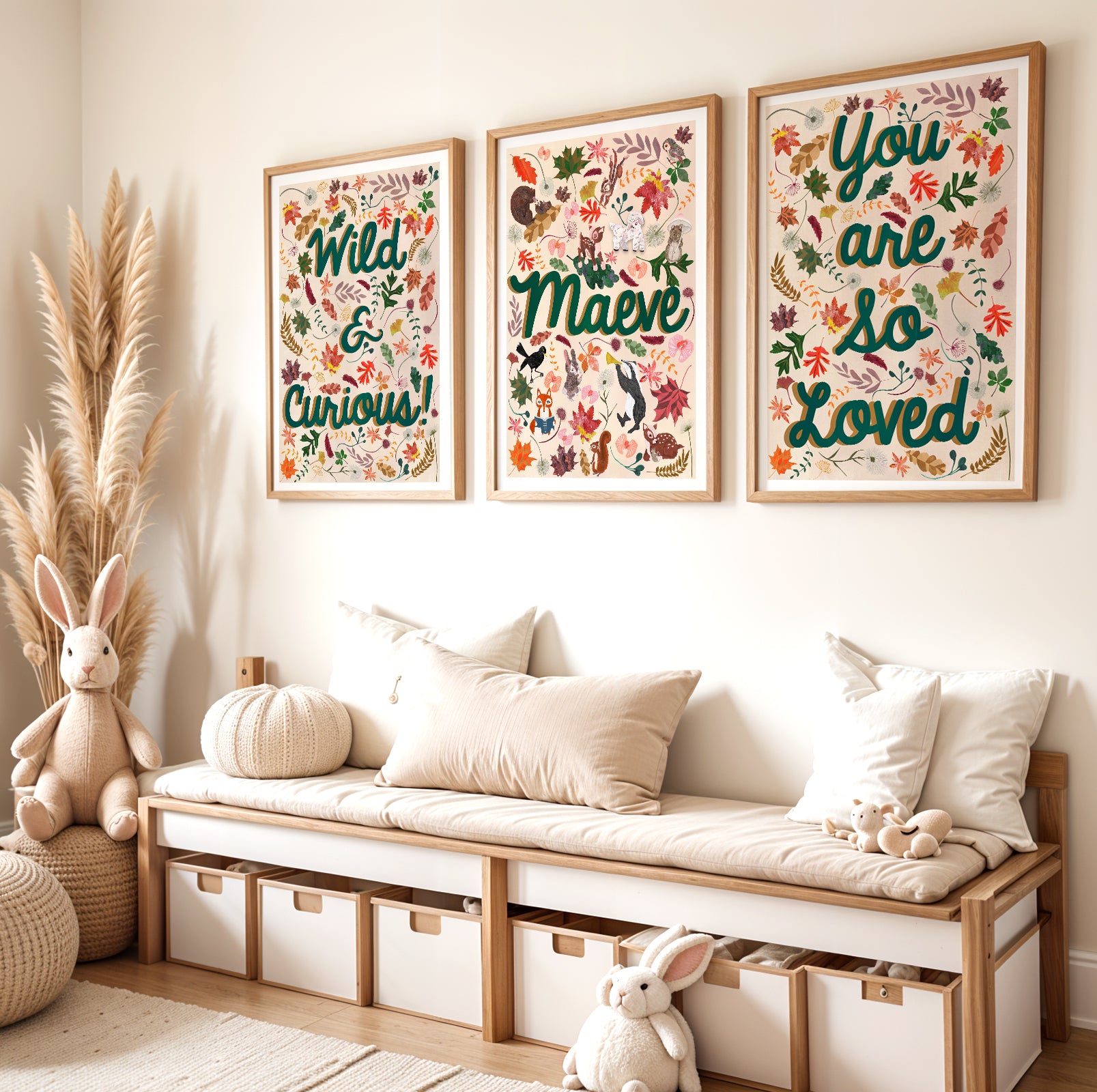 Nursery room with wooden bench, storage bins, stuffed animals, and framed wall art.