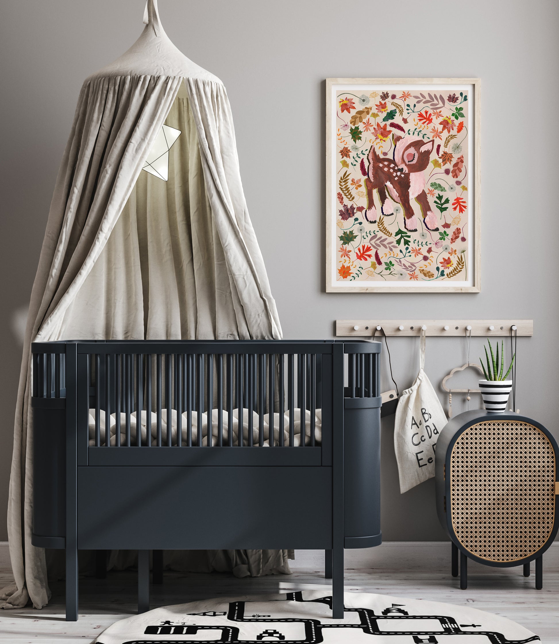 Nursery room with a black crib, decorative wall art, and a round rug.