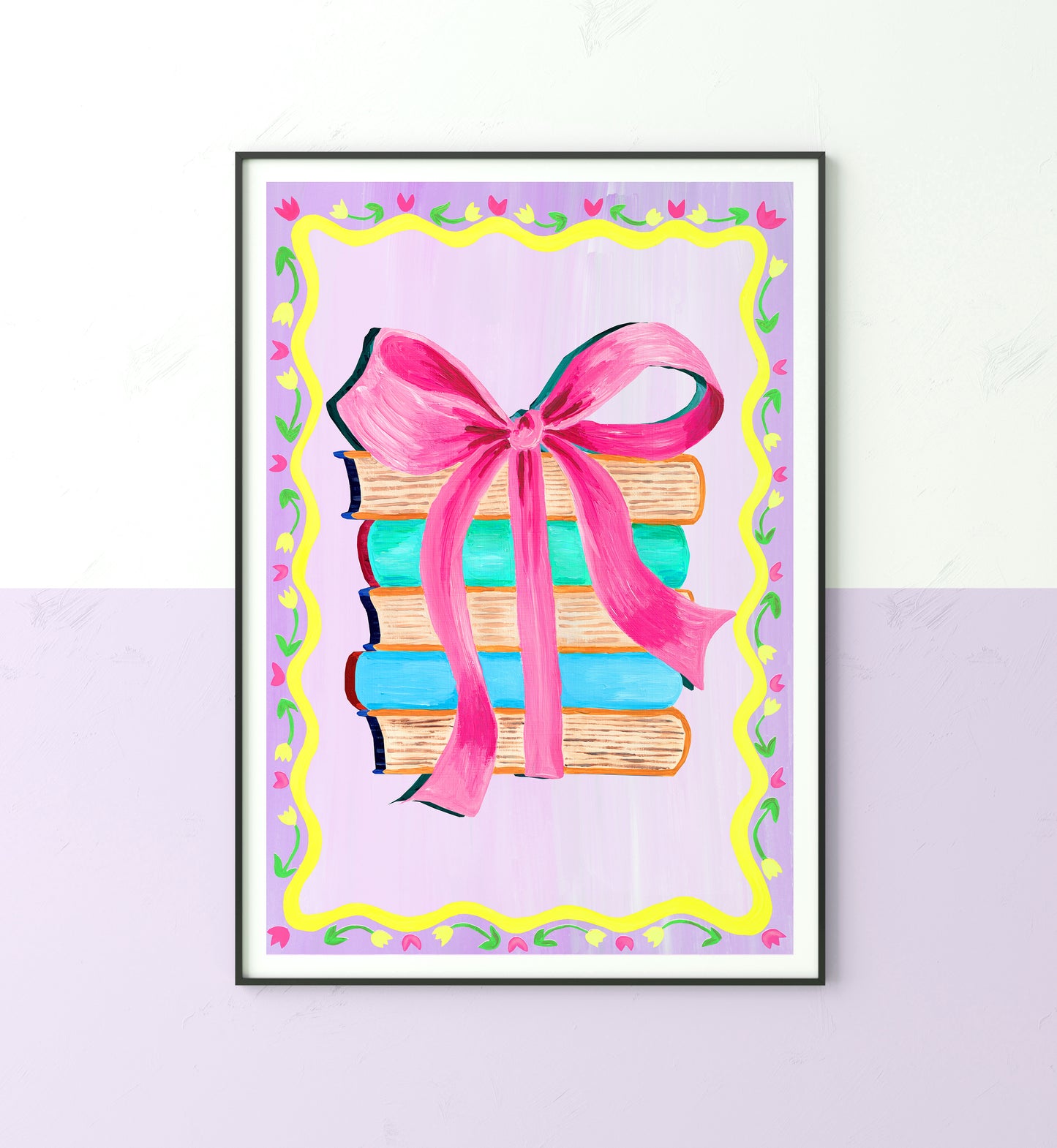 Framed artwork of books with a pink ribbon on a light purple background