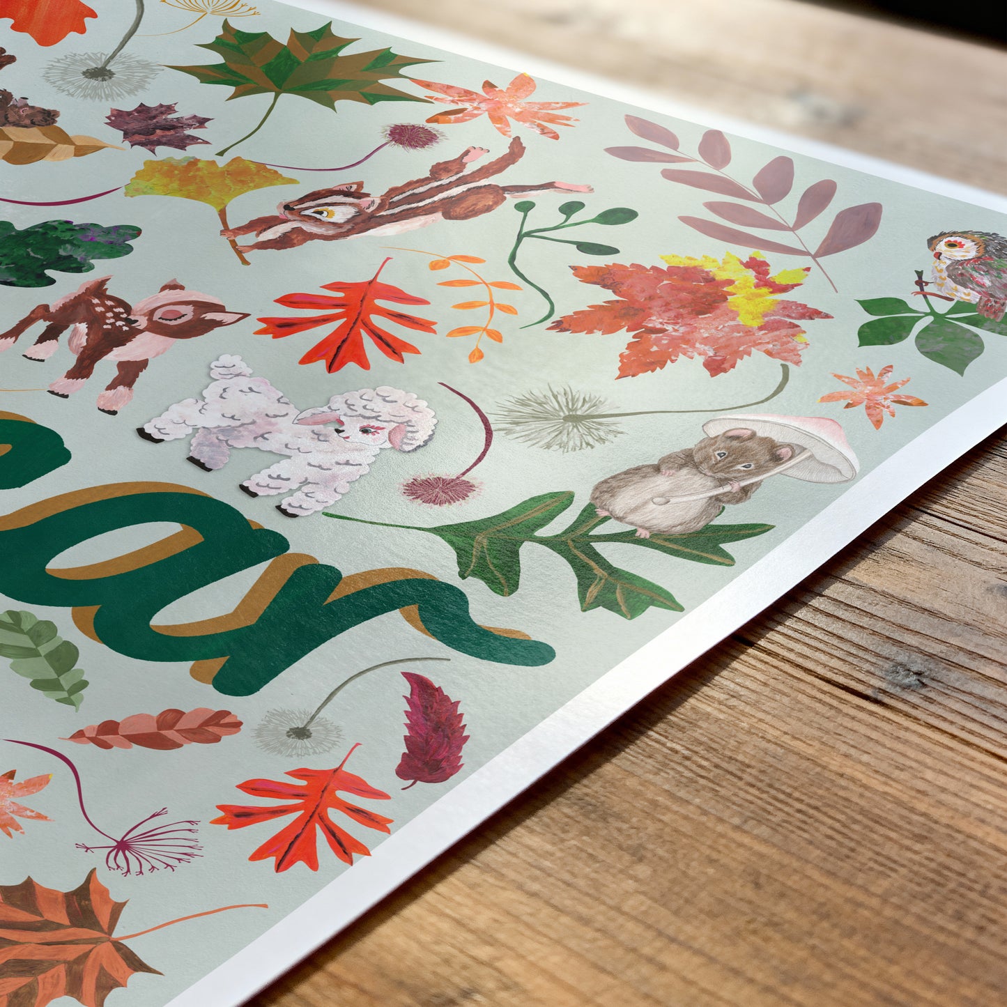 Colorful children's book with animal illustrations on a wooden surface