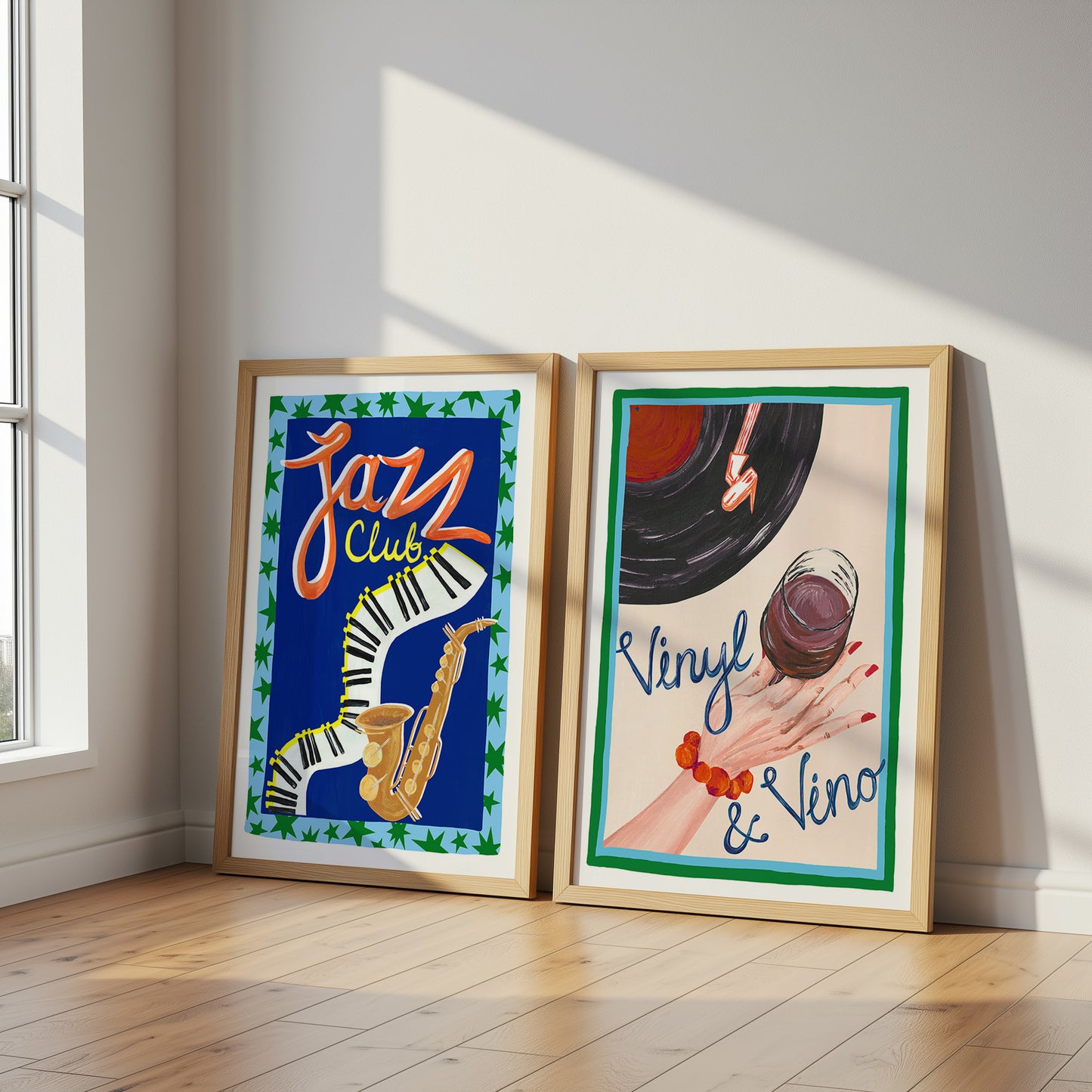 Two framed posters on a wall with 'Jazz Club' and 'Vinyl & Vino' themes.