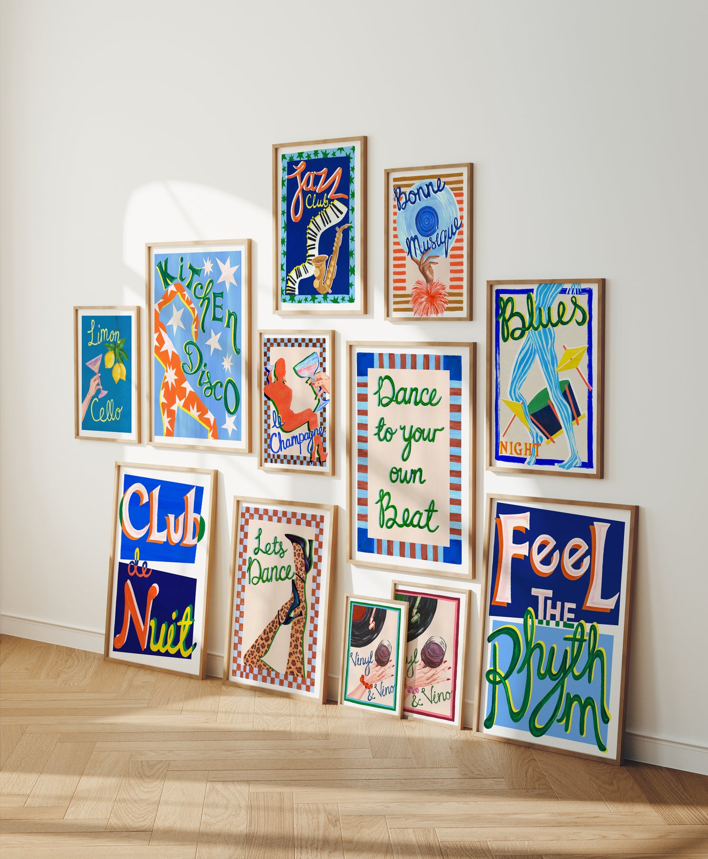 Collection of colorful framed posters on a wall