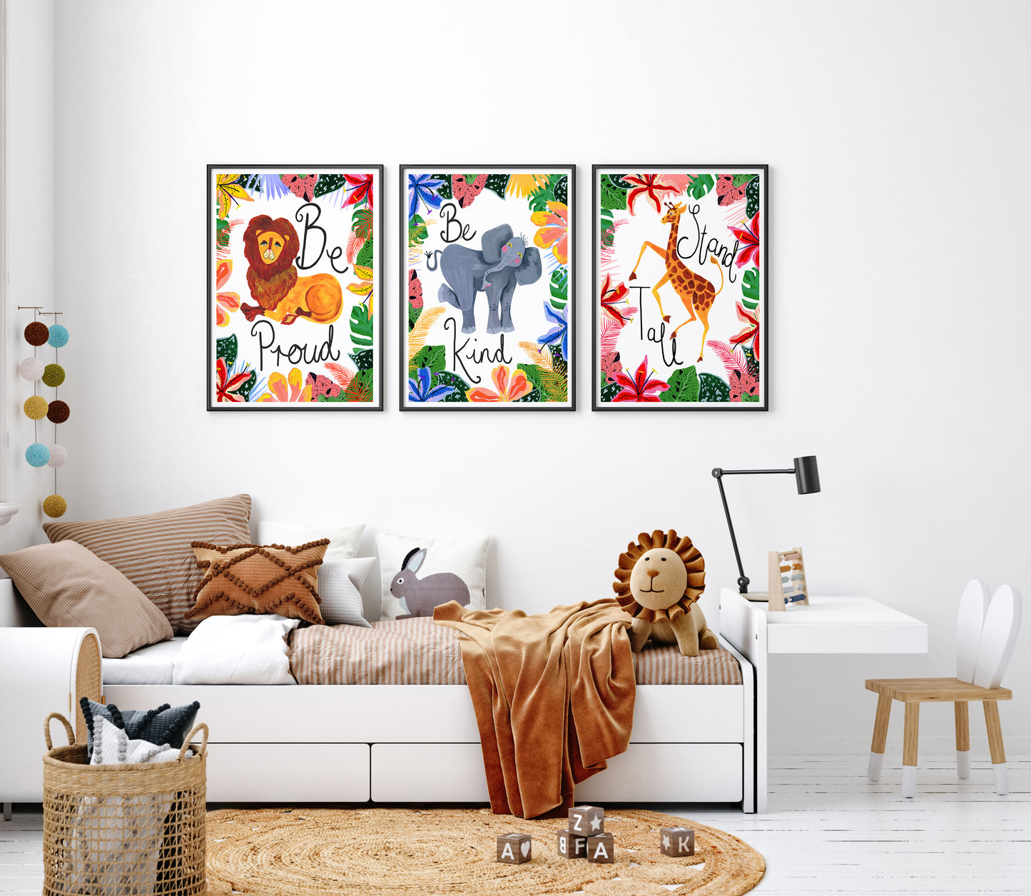 Children's room with colorful animal-themed wall art and a bed.