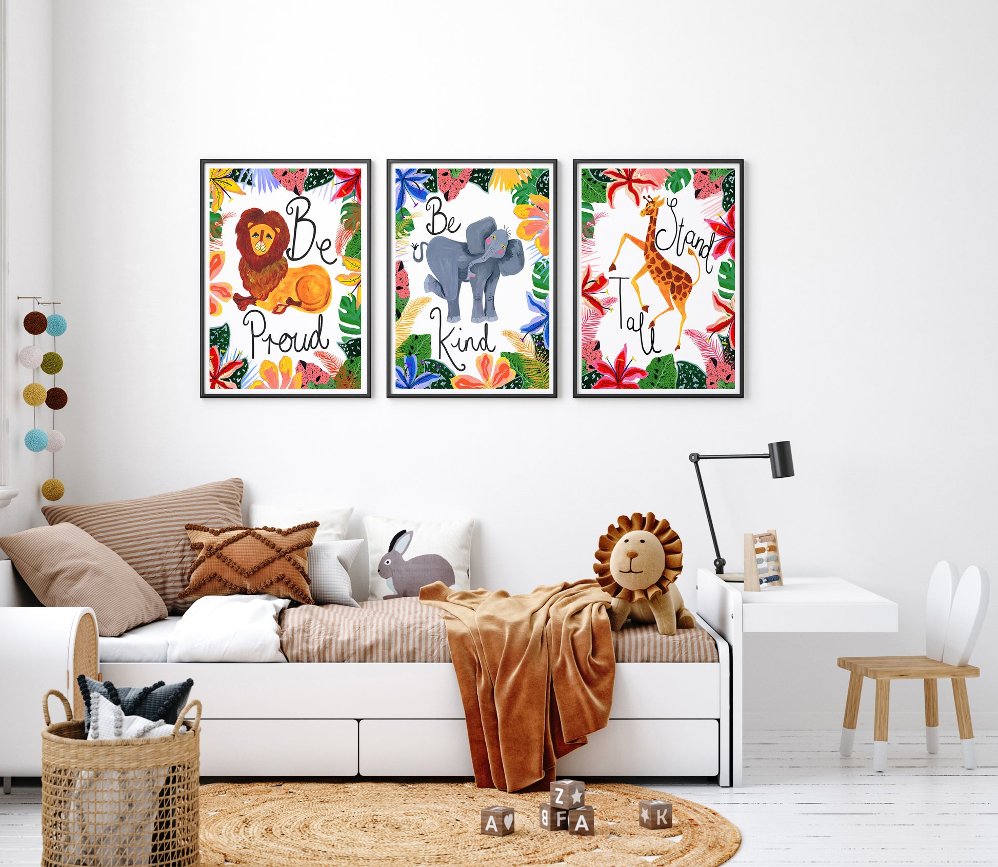 Children's room with colorful animal-themed wall art and a bed.