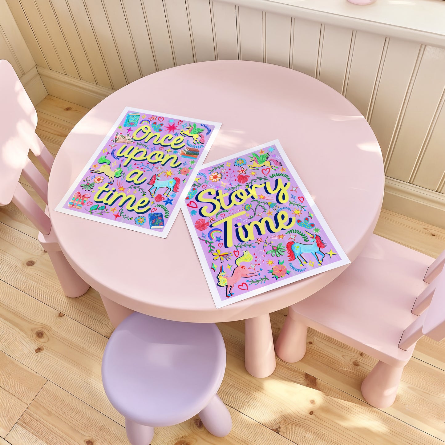Children's table with chairs and 'Story Time' posters on a wooden floor.
