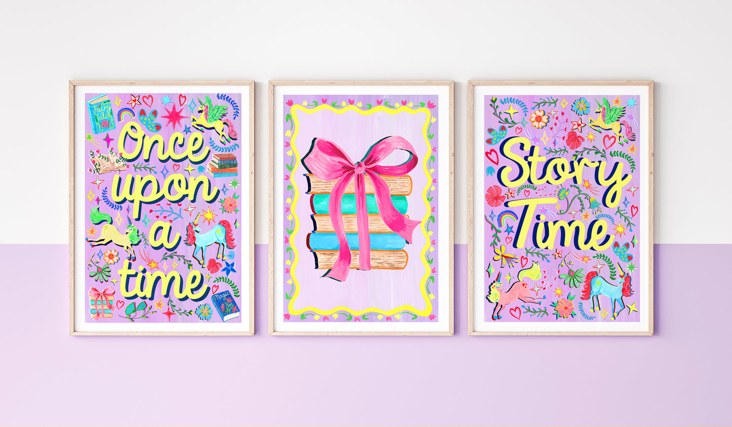 Three colorful framed prints with 'Once upon a time', 'Story Time', and a gift box design on a purple background.