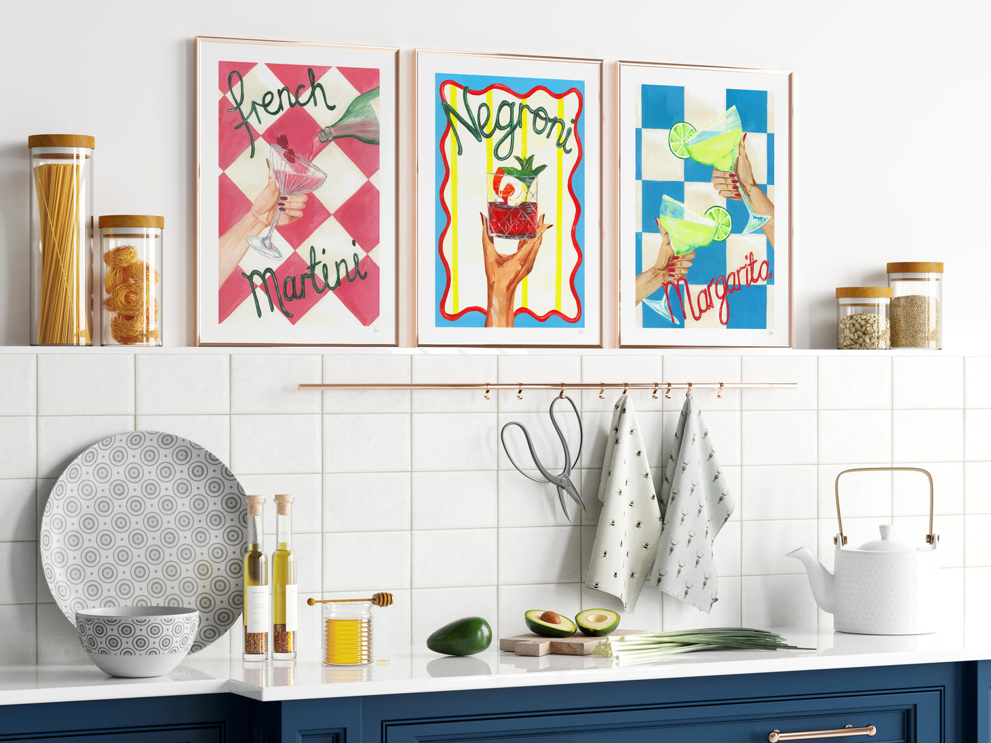 Kitchen with colorful wall art and white tiled backsplash