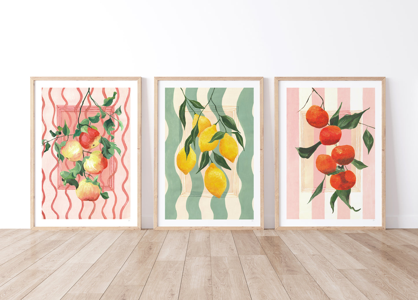 set of hand painted fruit prints one of leafy apples, leafy leomsn and leafy oranges with painted striped backgrounds