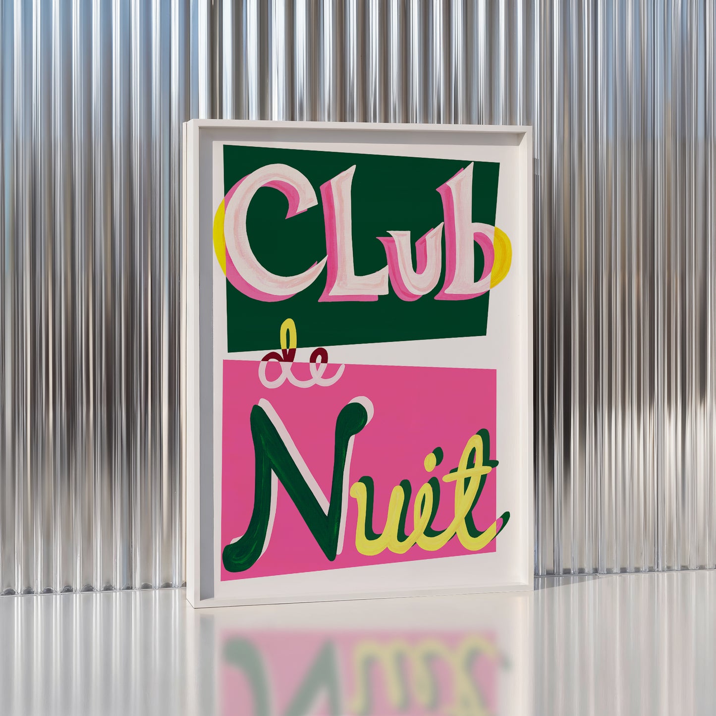Framed artwork with 'Club de Nuit' text on a metallic background