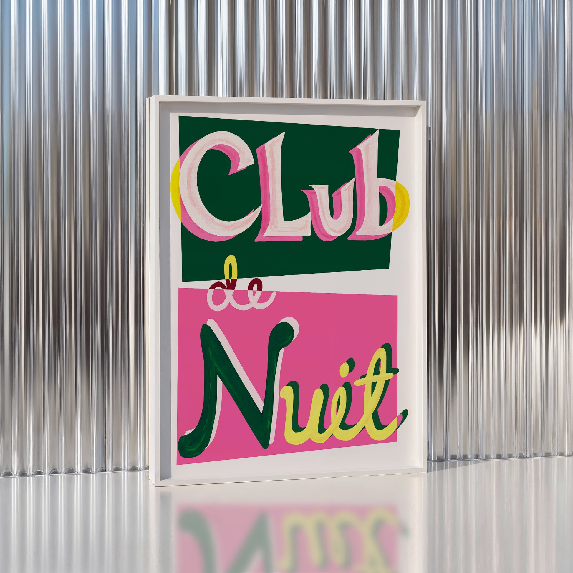 Framed artwork with 'Club de Nuit' text on a metallic background
