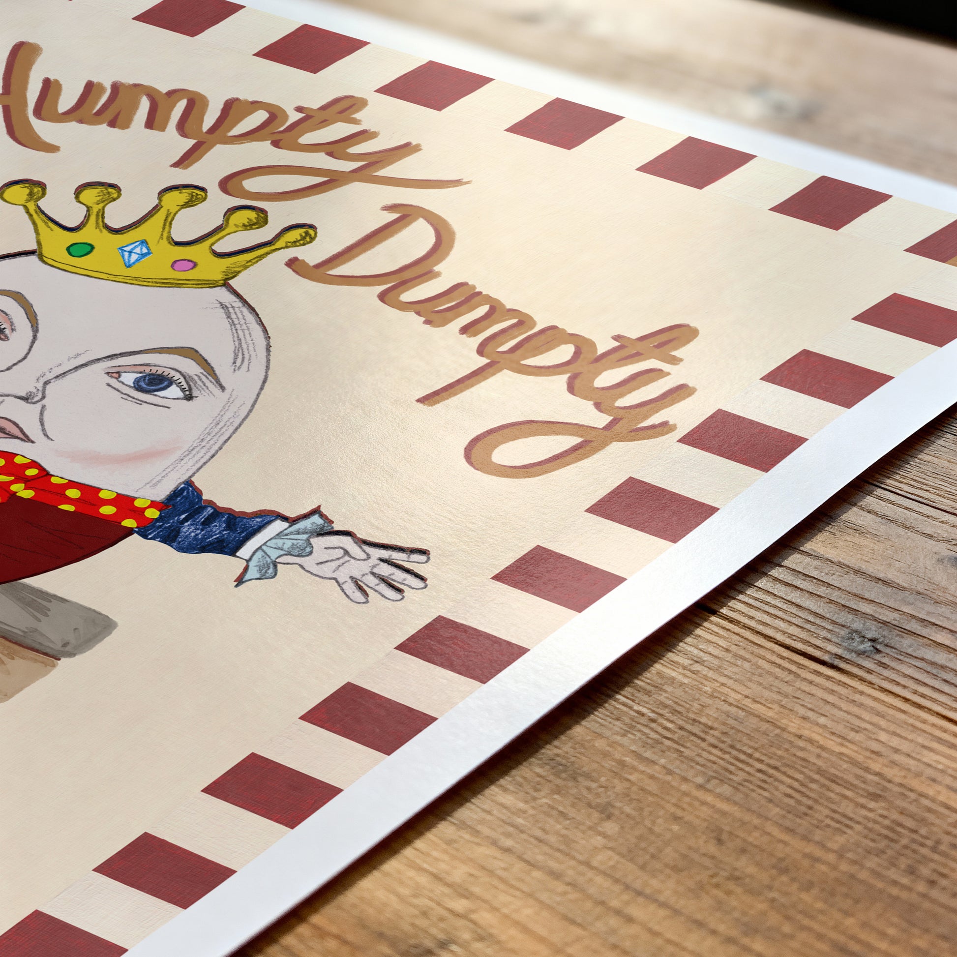 Illustration of Humpty Dumpty with a crown on a wooden surface