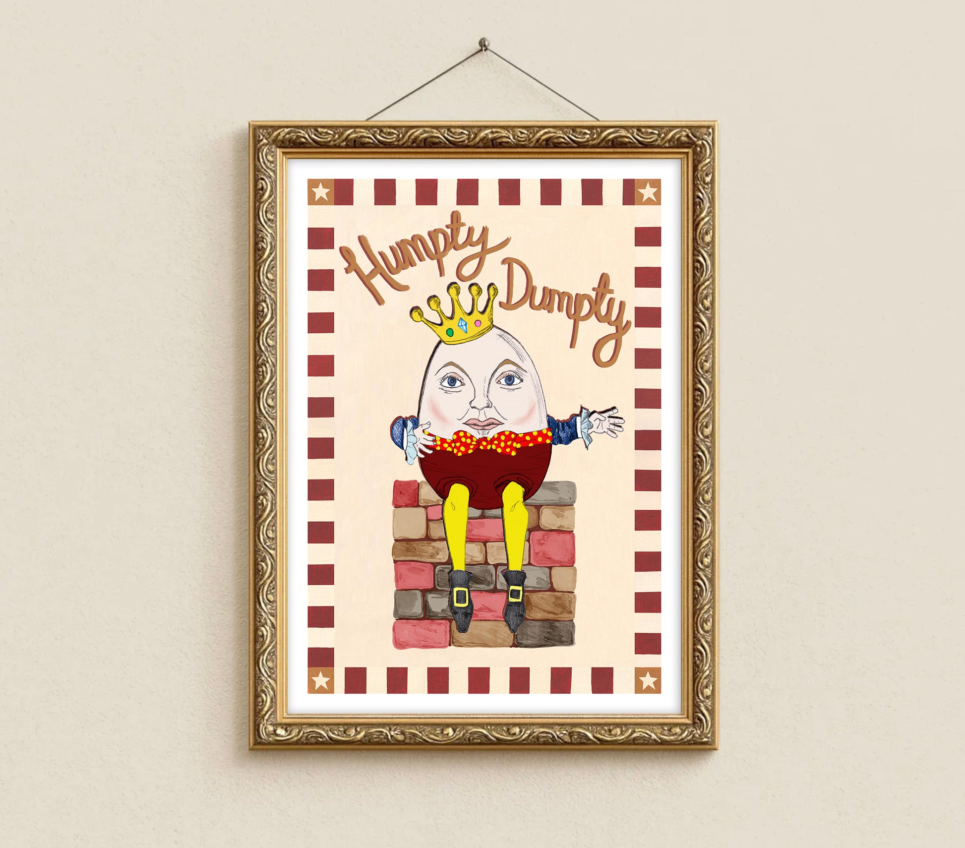 Framed artwork of Humpty Dumpty on a beige wall