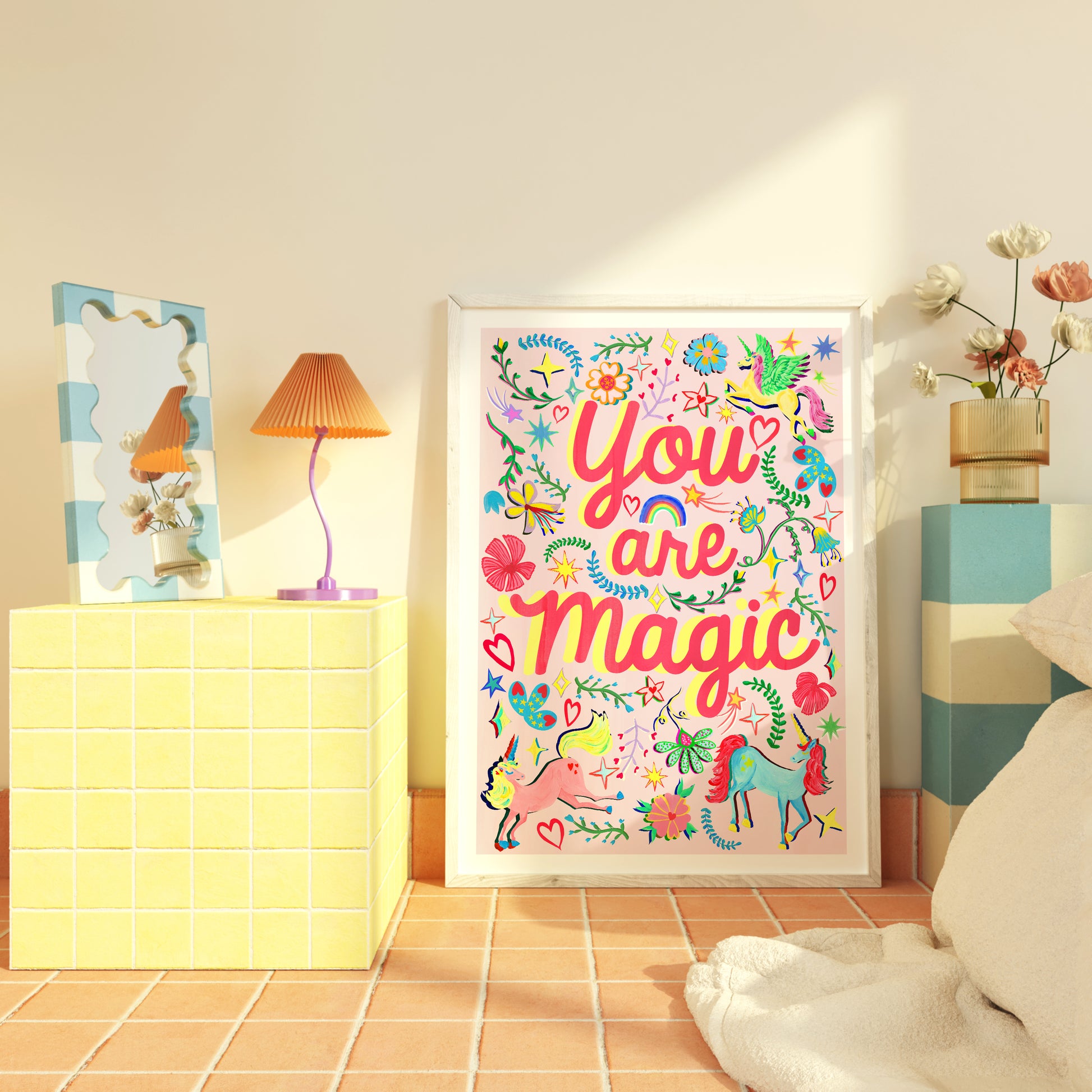 Decorative poster with 'You are Magic' text in a colorful frame on a wall.