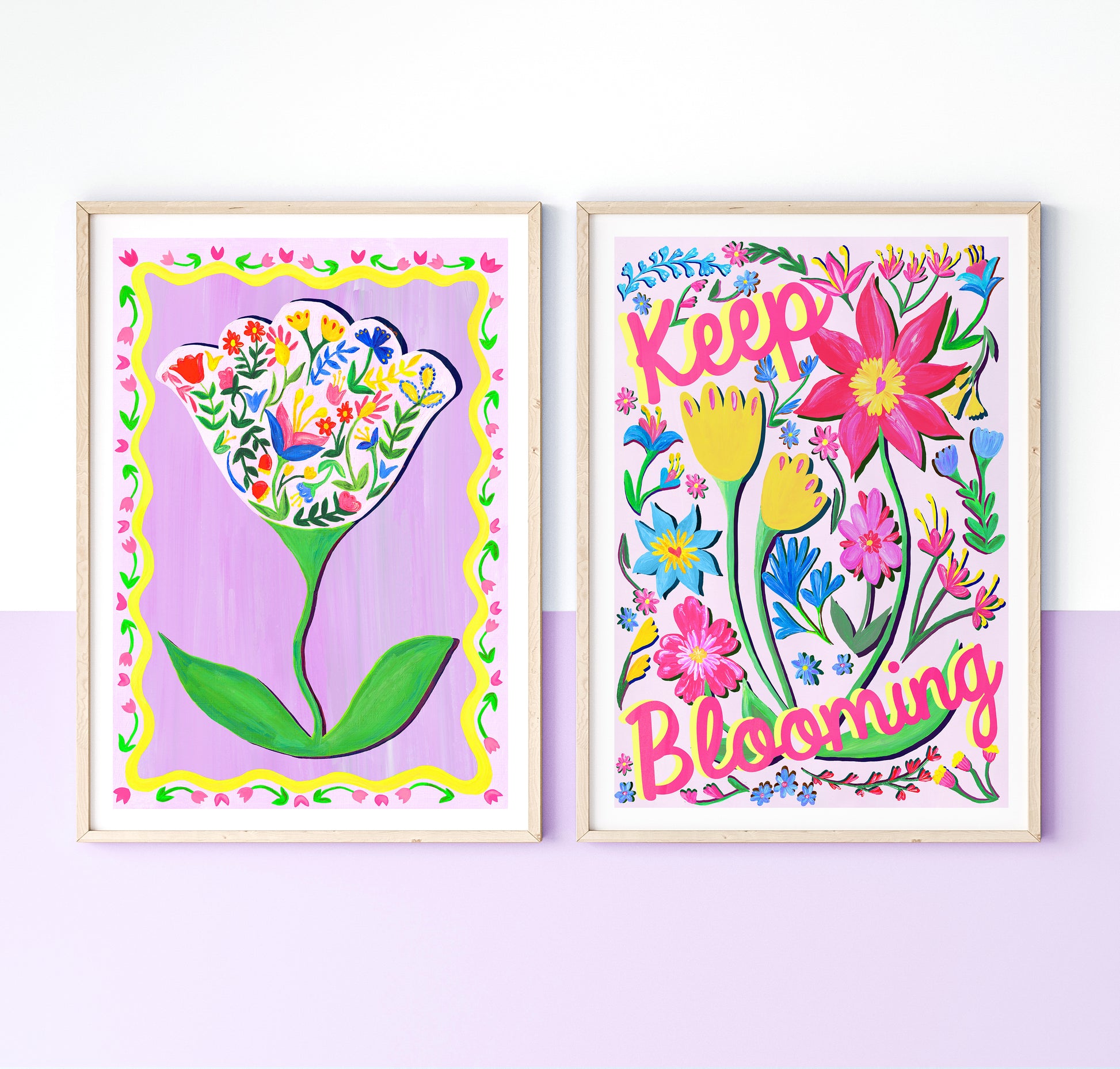 Two colorful floral prints with decorative frames on a light purple background