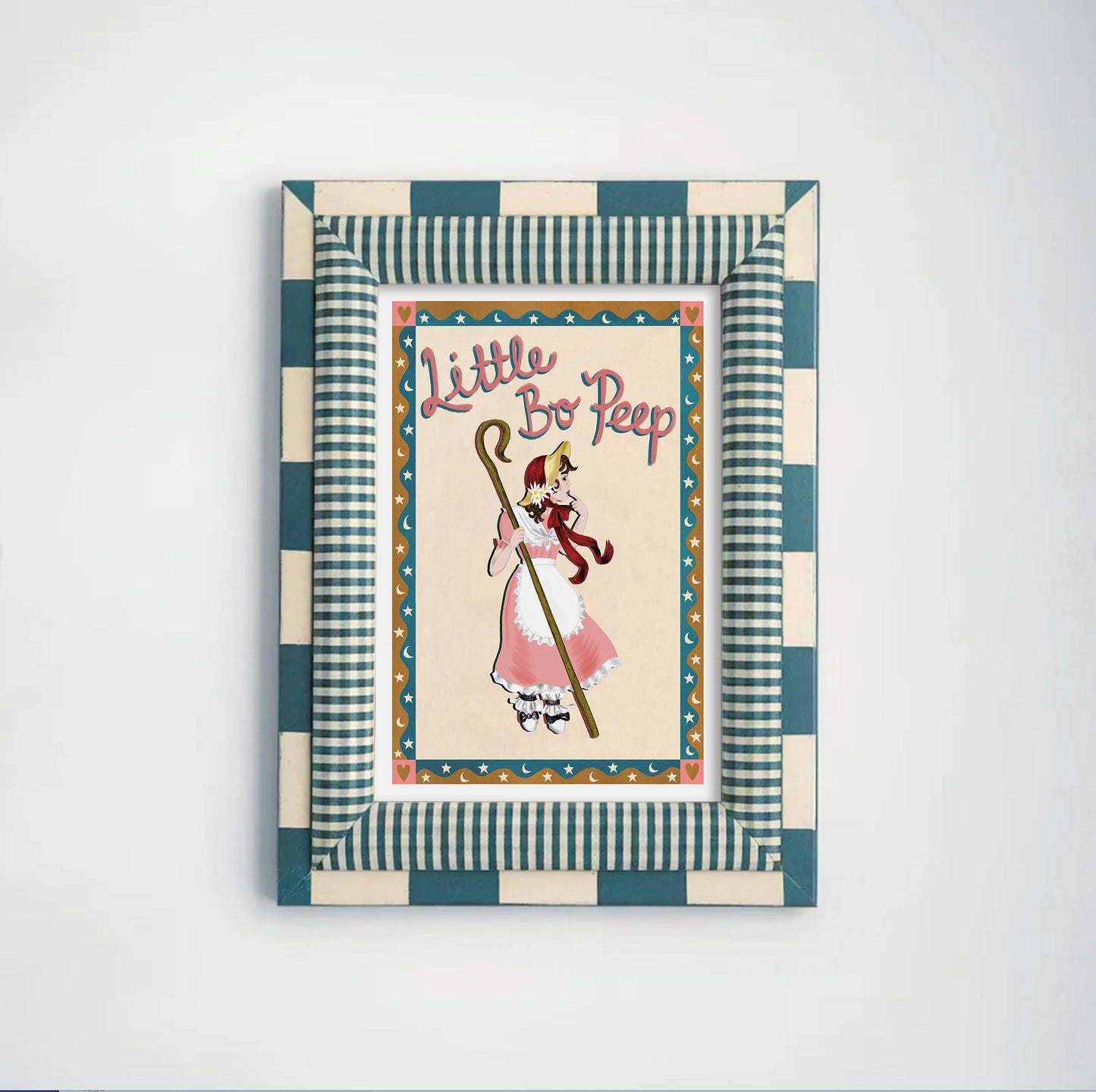 Framed artwork with 'Little Bo Peep' illustration on a white background