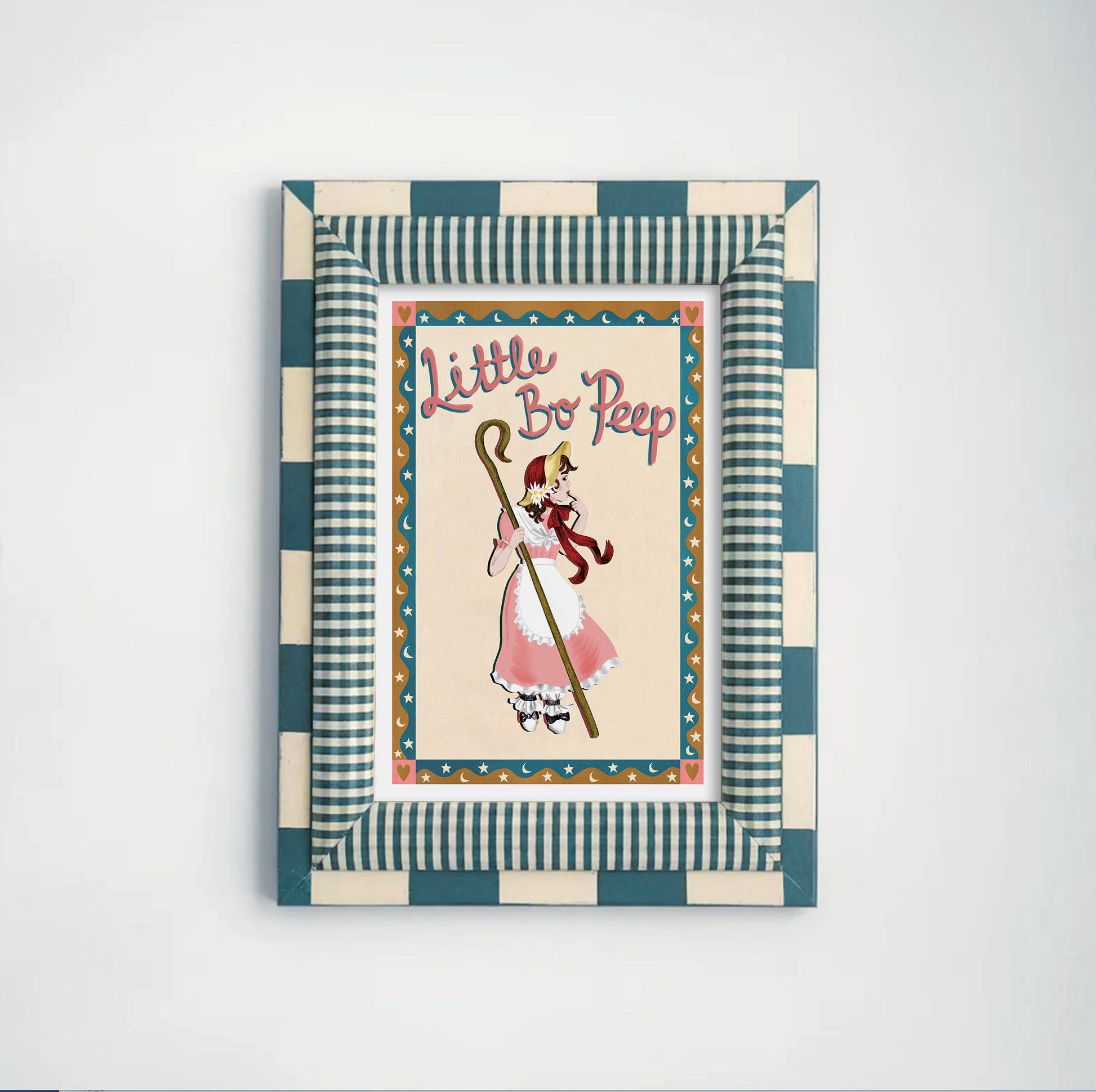 Framed artwork with 'Little Bo Peep' illustration on a white background