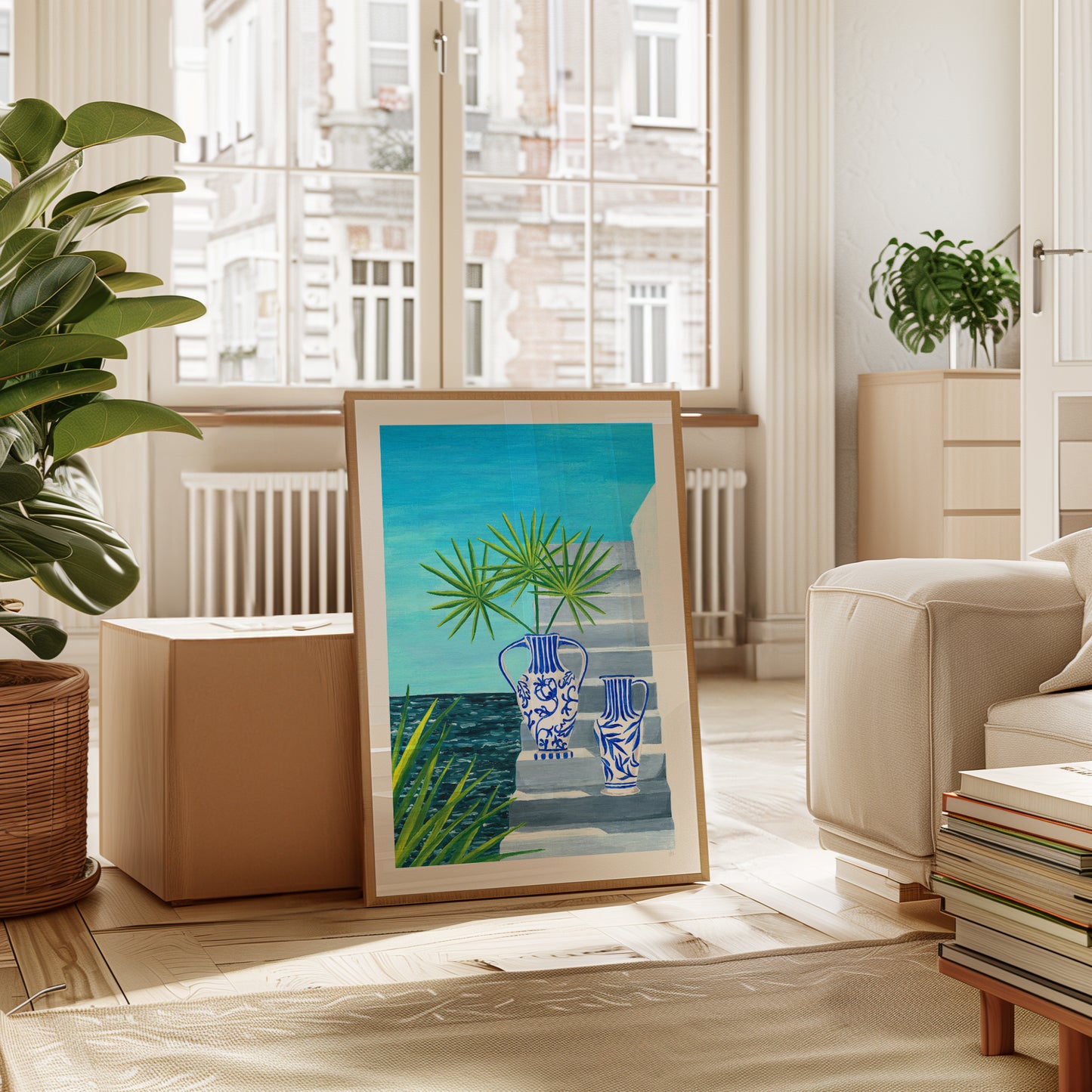 Framed artwork of blue vases and greenery in a living room setting