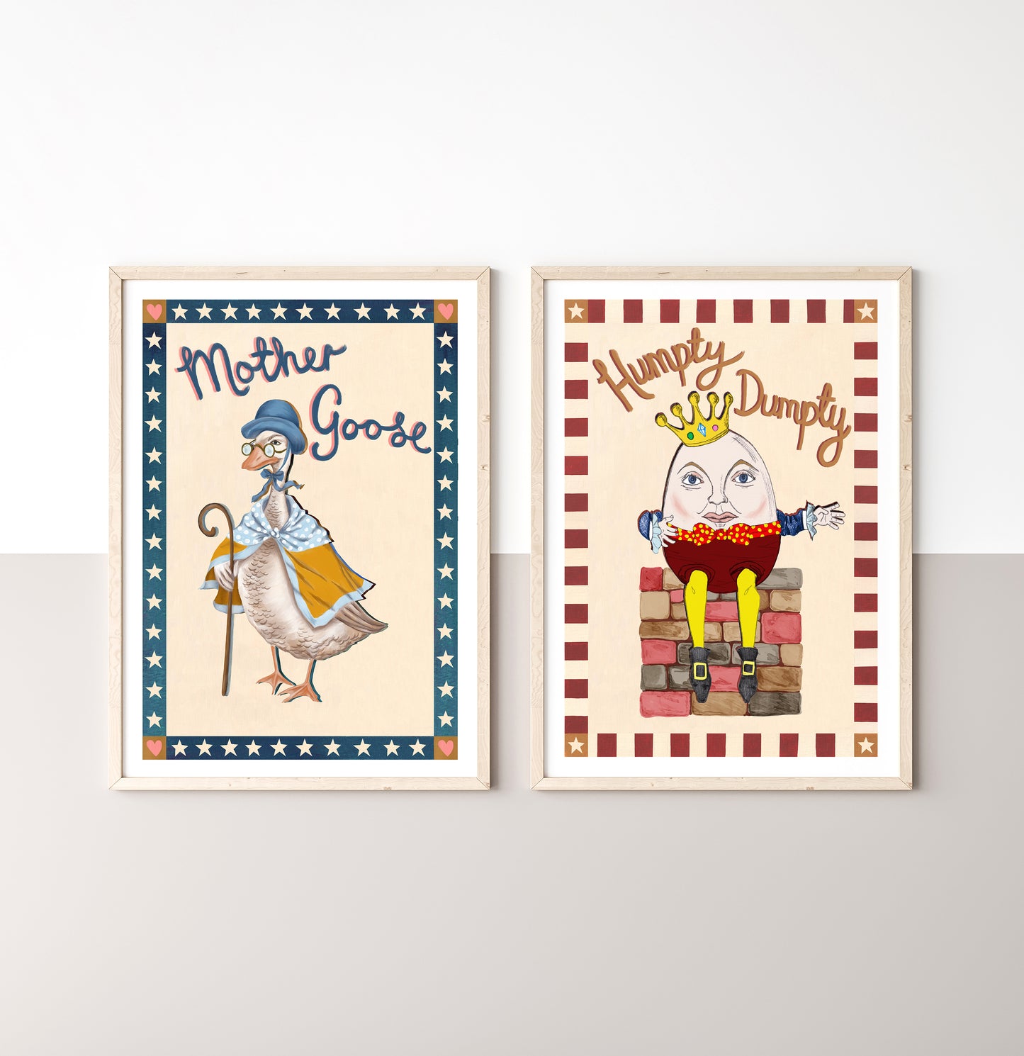 Two framed illustrations of Mother Goose and Humpty Dumpty on a wall.
