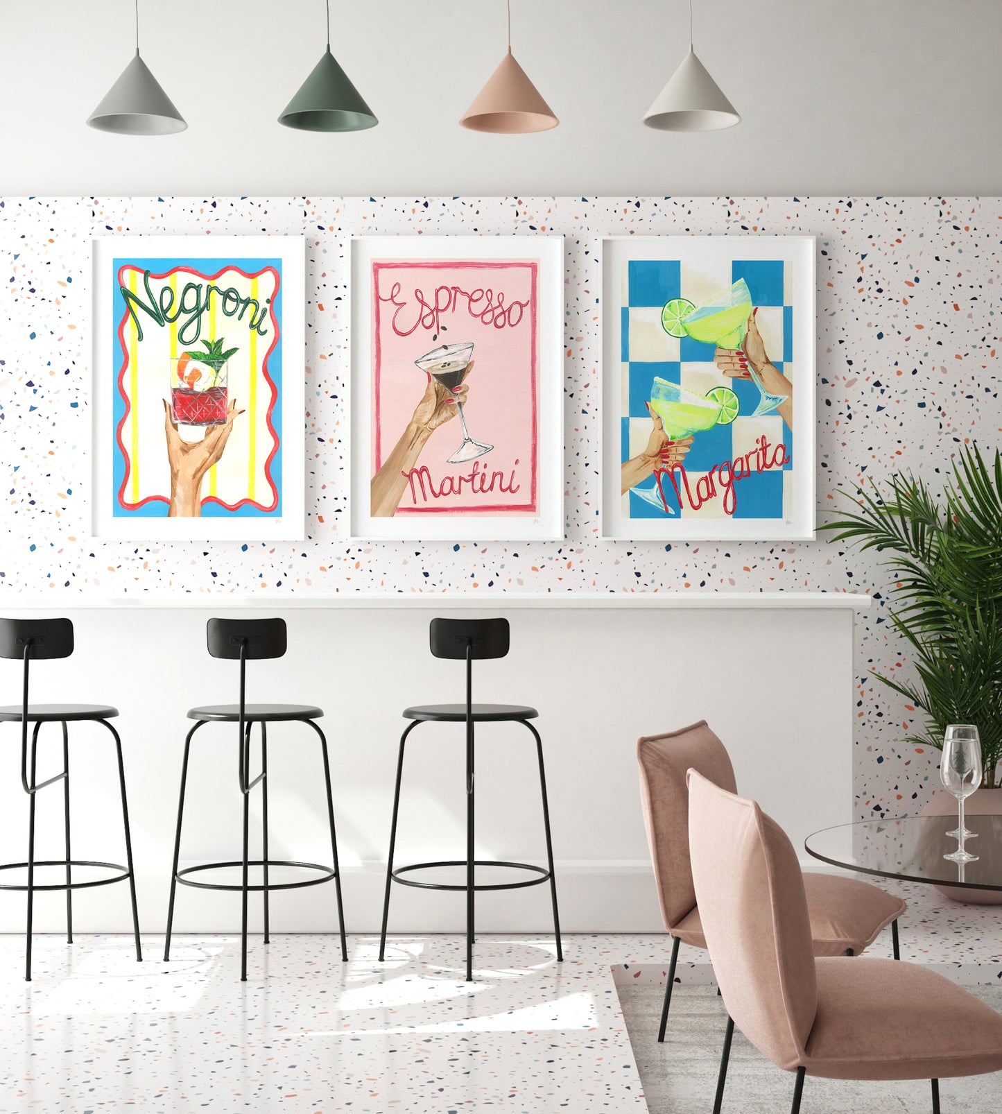 Modern kitchen with colorful wall art, bar stools, and a dining table.