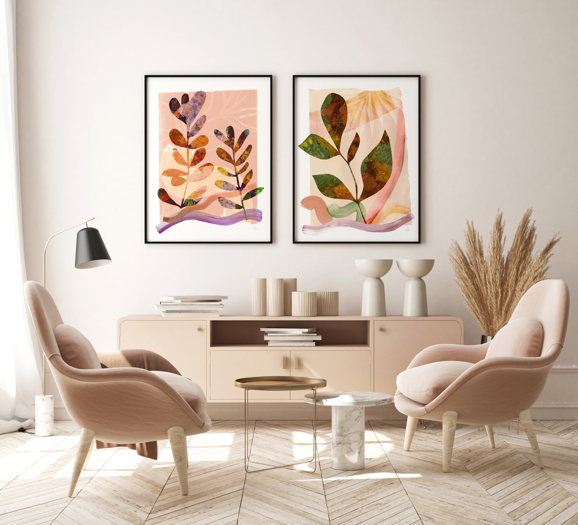 Modern living room with two abstract art pieces on the wall, two pink chairs, and a coffee table.