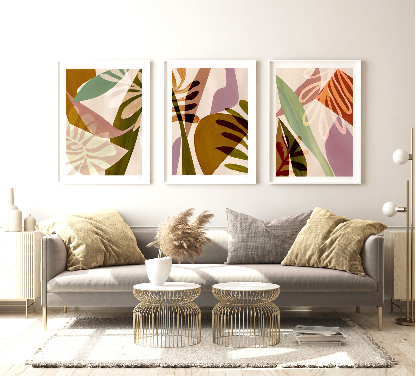 Modern living room with a gray sofa, abstract wall art, and decorative items.