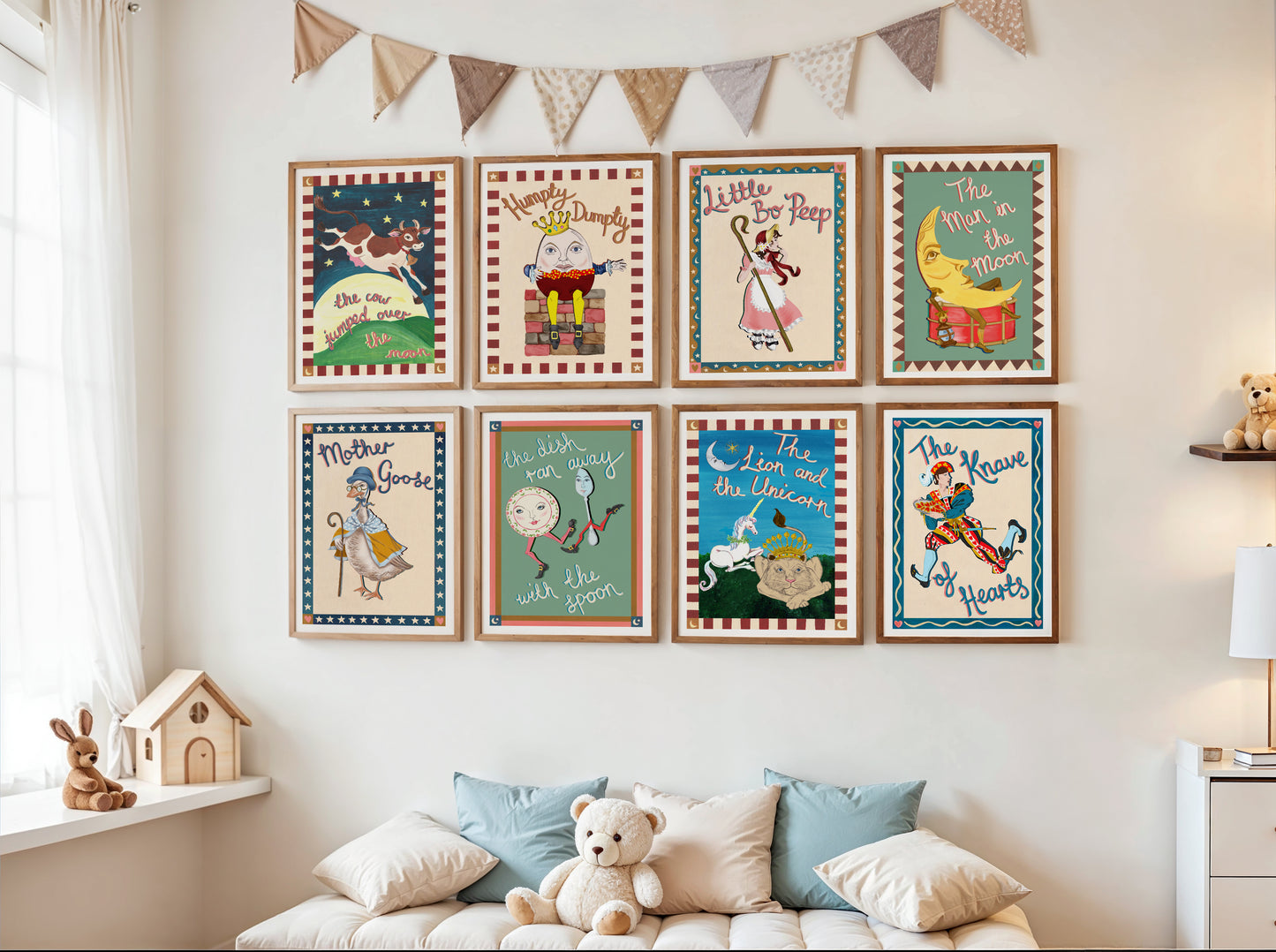 Children's room with framed illustrations on the wall and a teddy bear on a sofa.