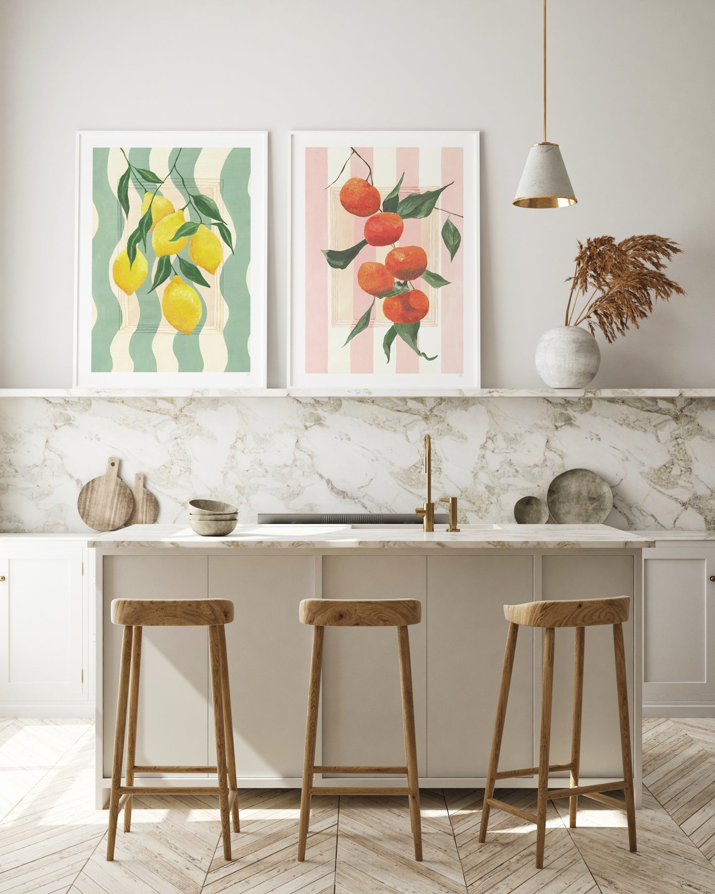 Modern kitchen with marble countertop, wooden stools, and decorative wall art.