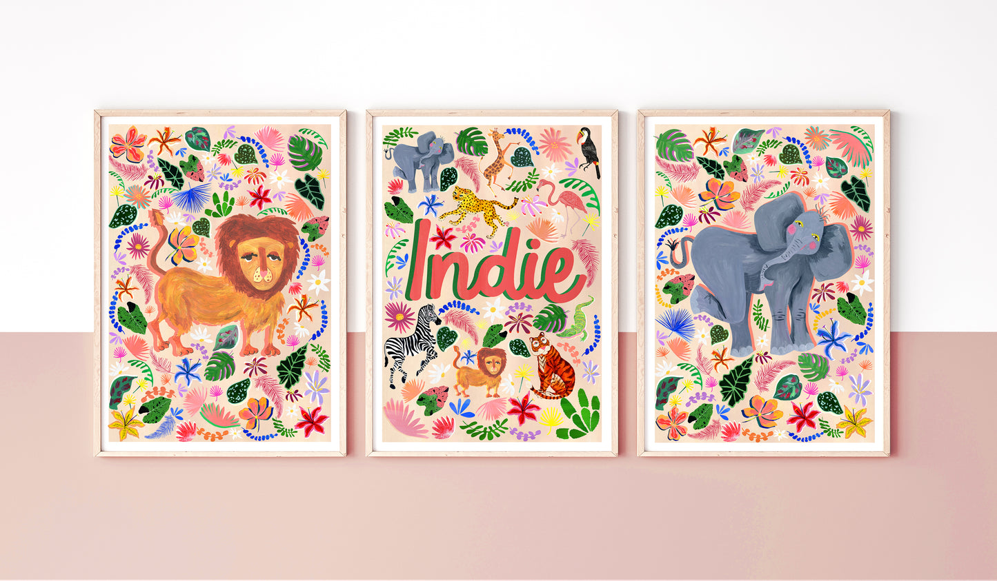 Three colorful animal-themed posters on a pink wall