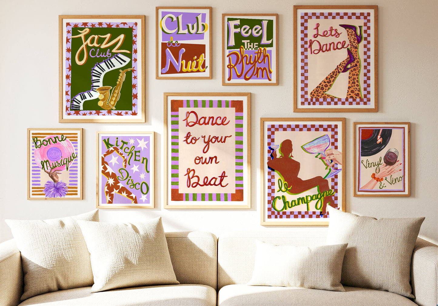 Colorful wall art prints on a wall above a sofa