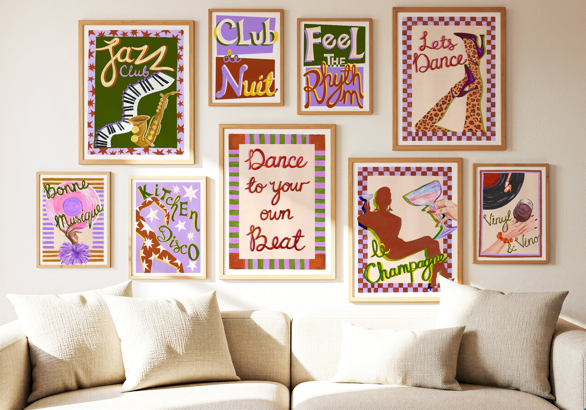 Colorful wall art prints on a wall above a sofa