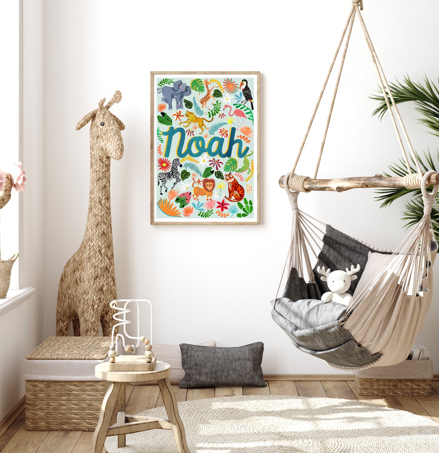 Children's room with a colorful 'Noah' poster, hammock, and stuffed animals.