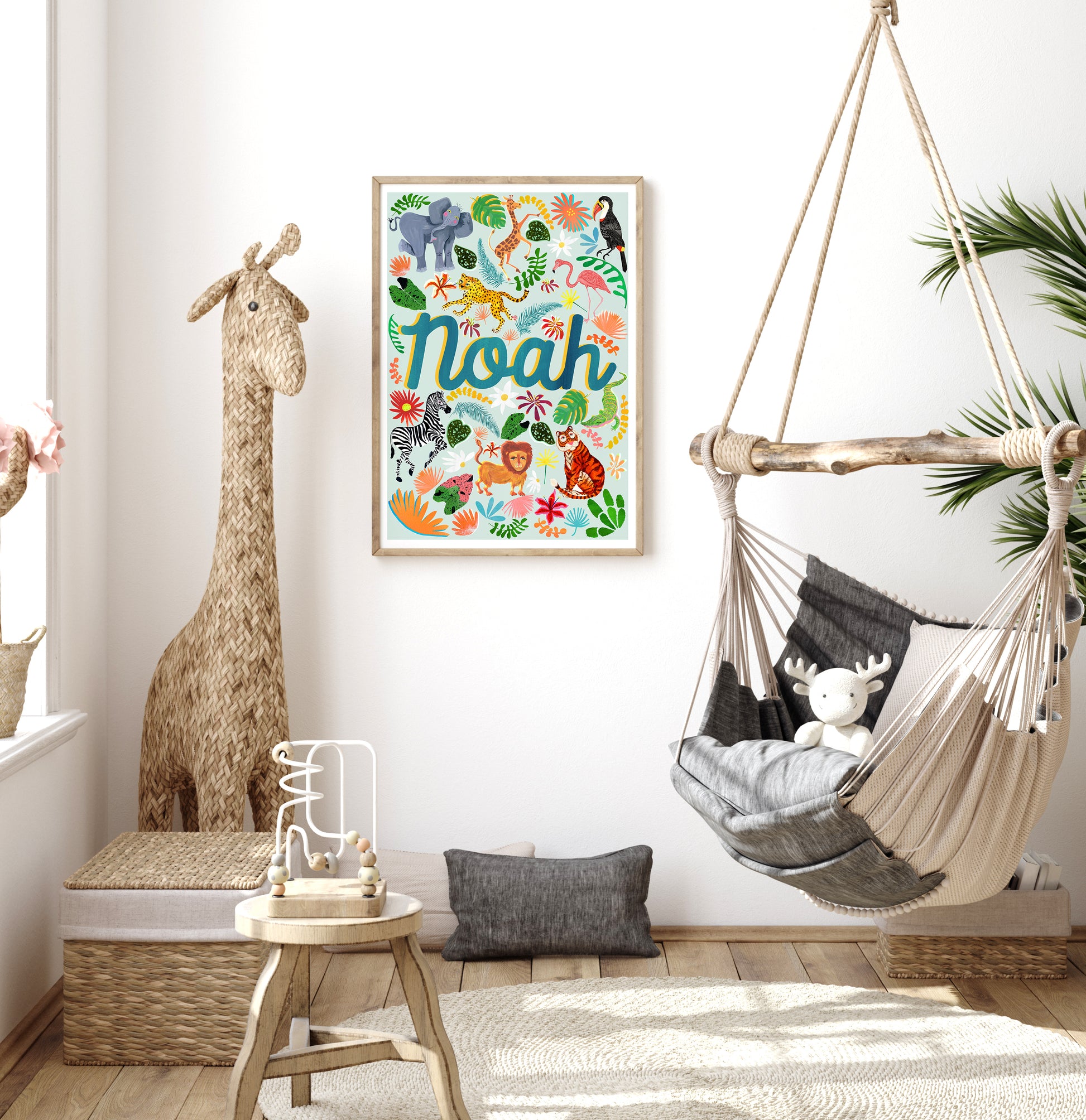 Children's room with a colorful 'Noah' poster, hammock, and stuffed animals.