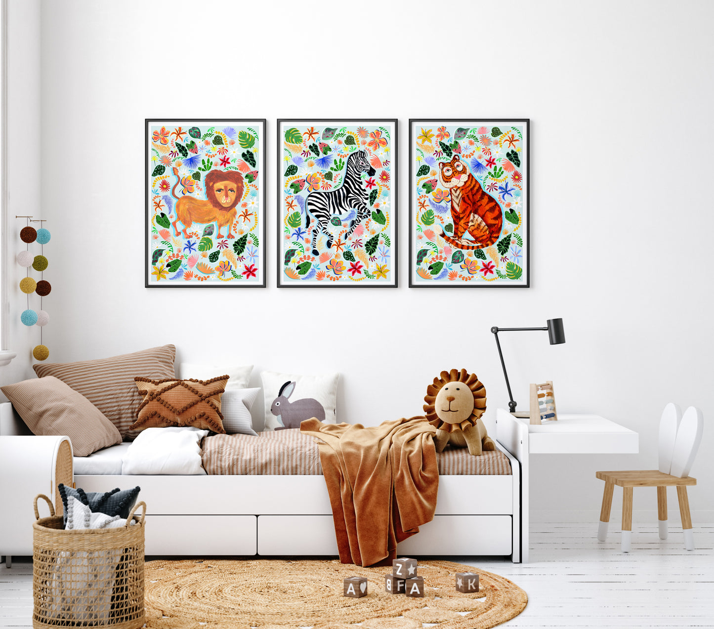 a kid room with safari animal soft toys and colourful safari animal wall art