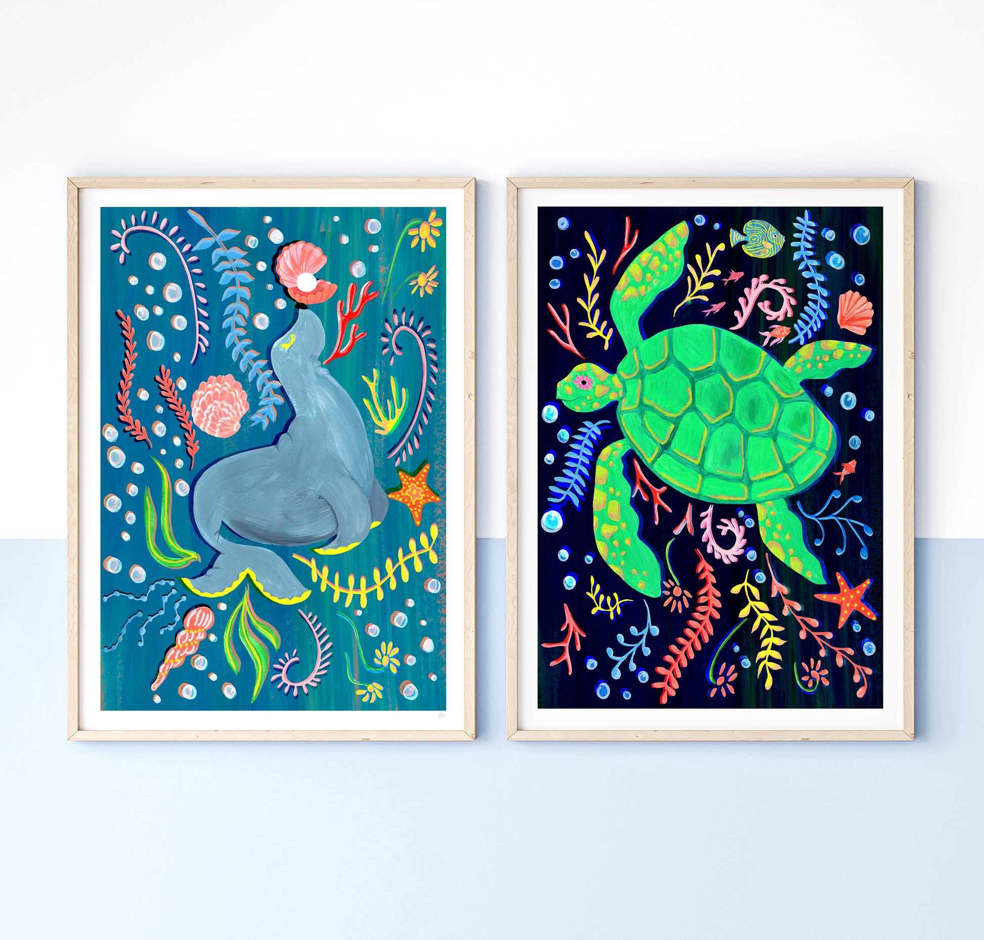 Two framed illustrations of a sea lion and a turtle with underwater elements on a white background.