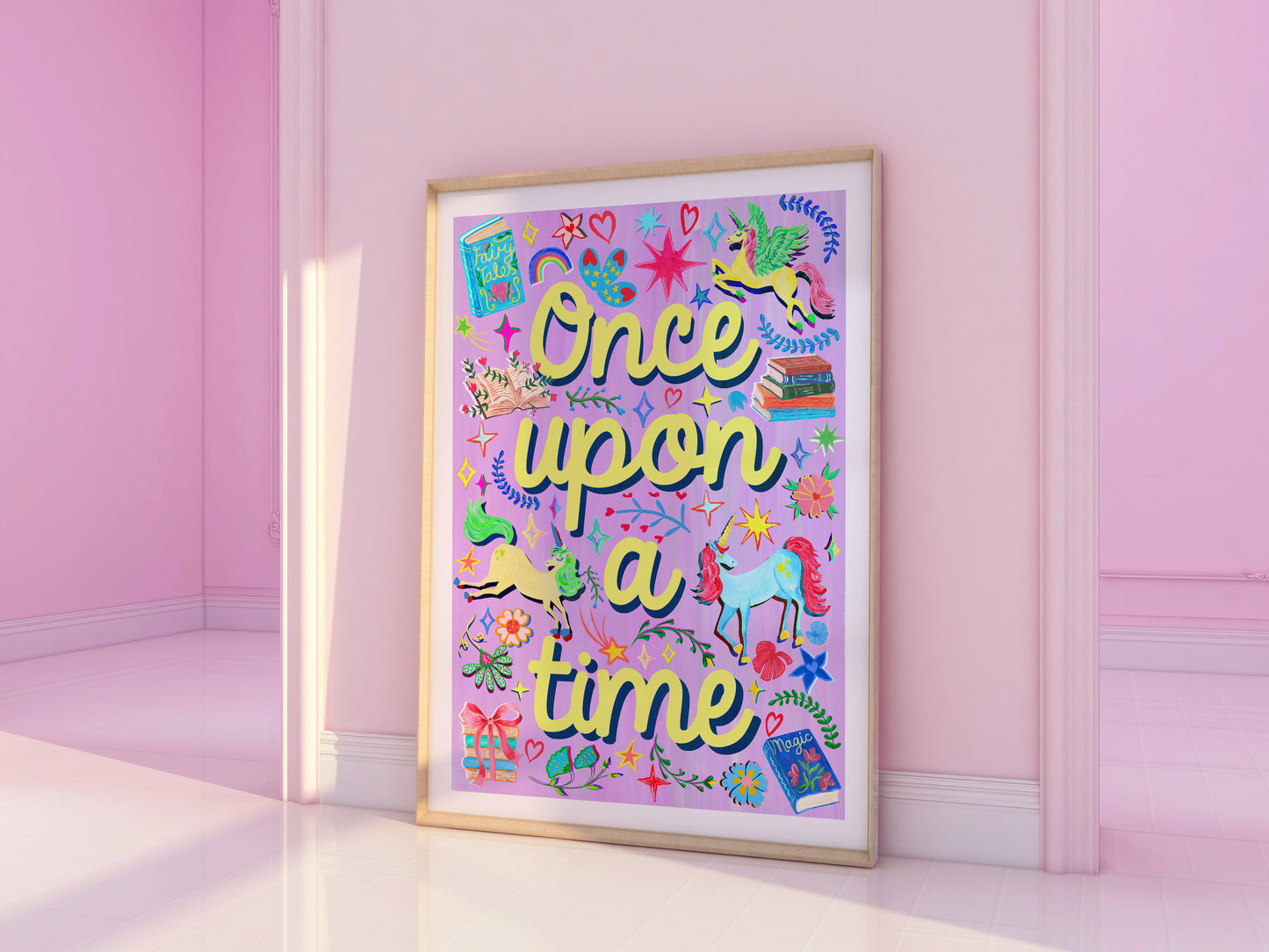 Framed colorful poster with 'Once upon a time' text and illustrations on a pink wall.