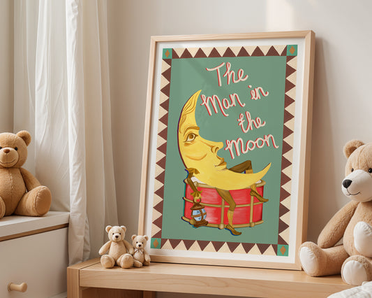 Framed children's poster with a moon design and teddy bears on a shelf.